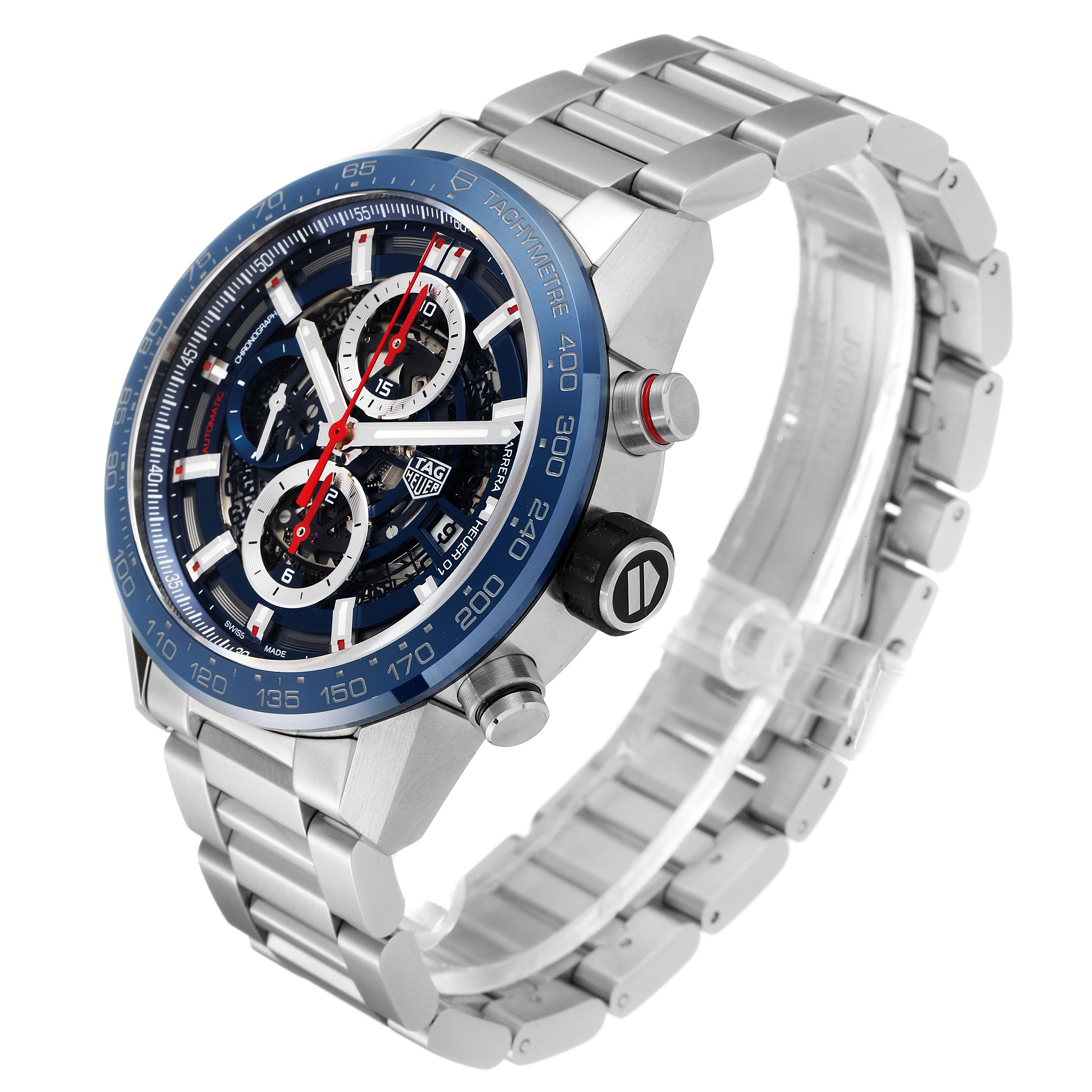 The image shows a side angle of the Tag Heuer Carrera CAR201T.BA0766 Men's Stainless Steel Blue Dial CAR201T.BA0766 Men's Stainless Steel Blue Dial watch, highlighting its face, bezel, crown, pushers, and metal bracelet.