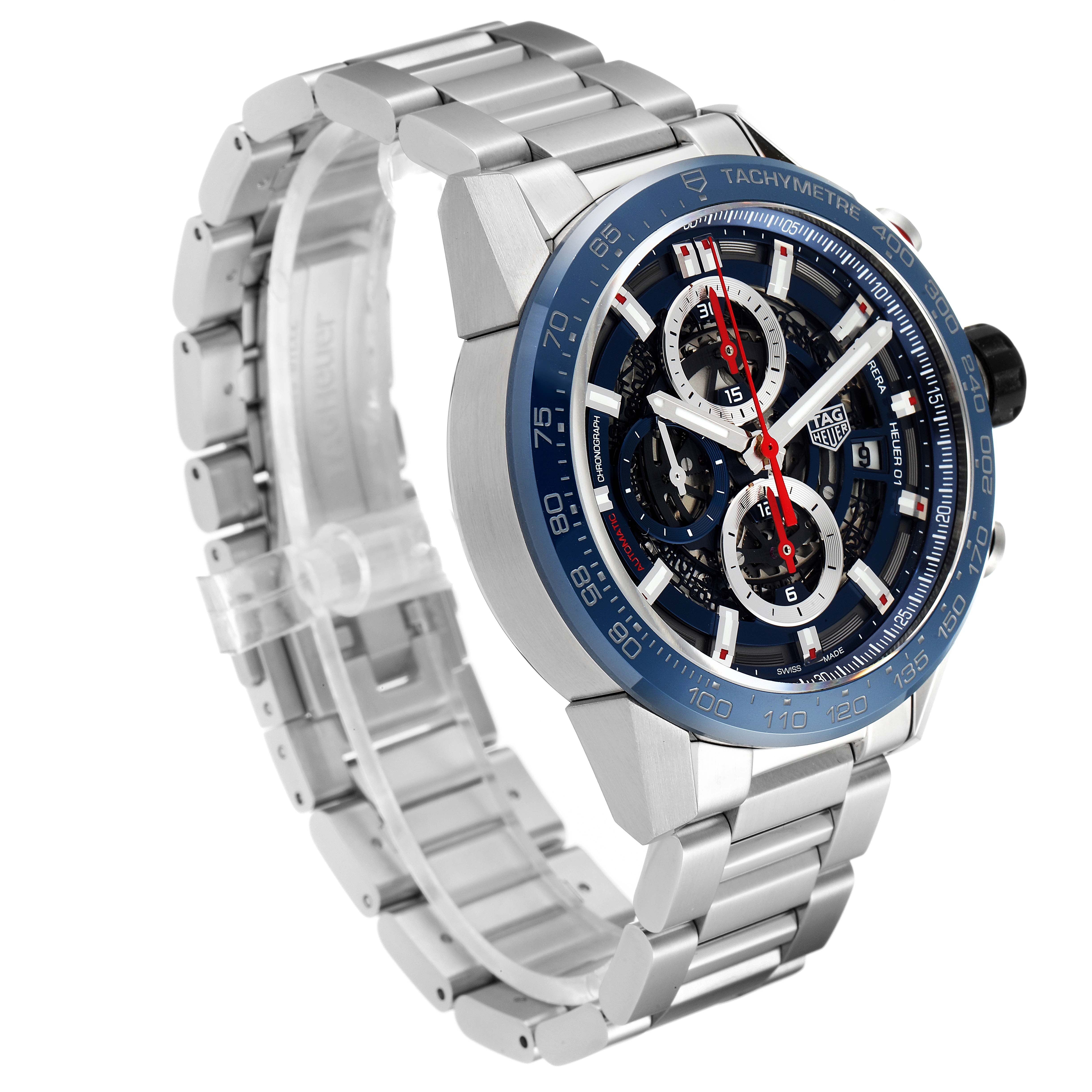 The Carrera model by Tag Heuer is shown at a slight angle displaying the face, bezel, and metal bracelet.