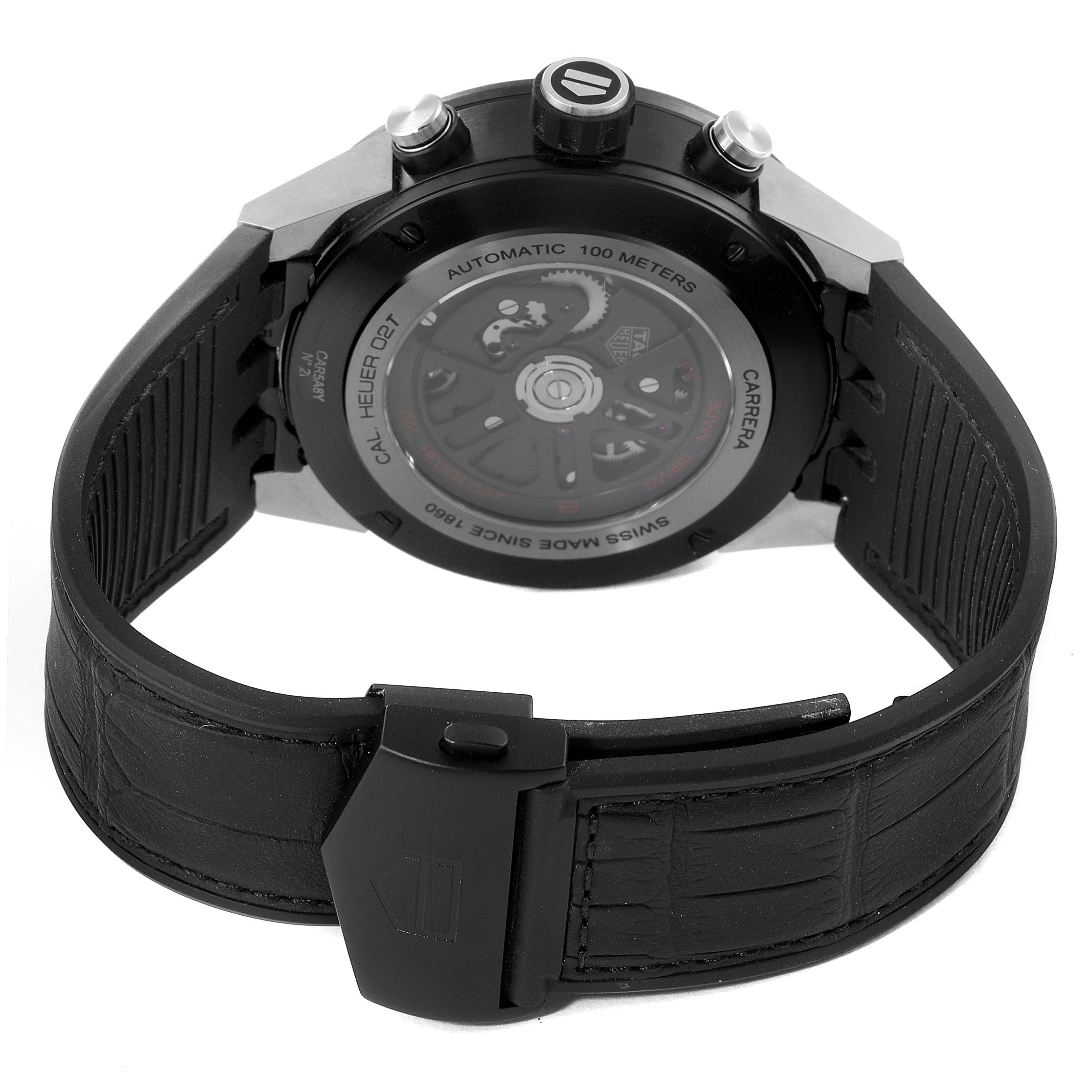 This image shows the back view of the Tag Heuer Carrera CAR5A8Y.FC6377 Men's Titanium Black Dial CAR5A8Y.FC6377 Men's Titanium Black Dial watch, highlighting its automatic movement and black rubber strap.