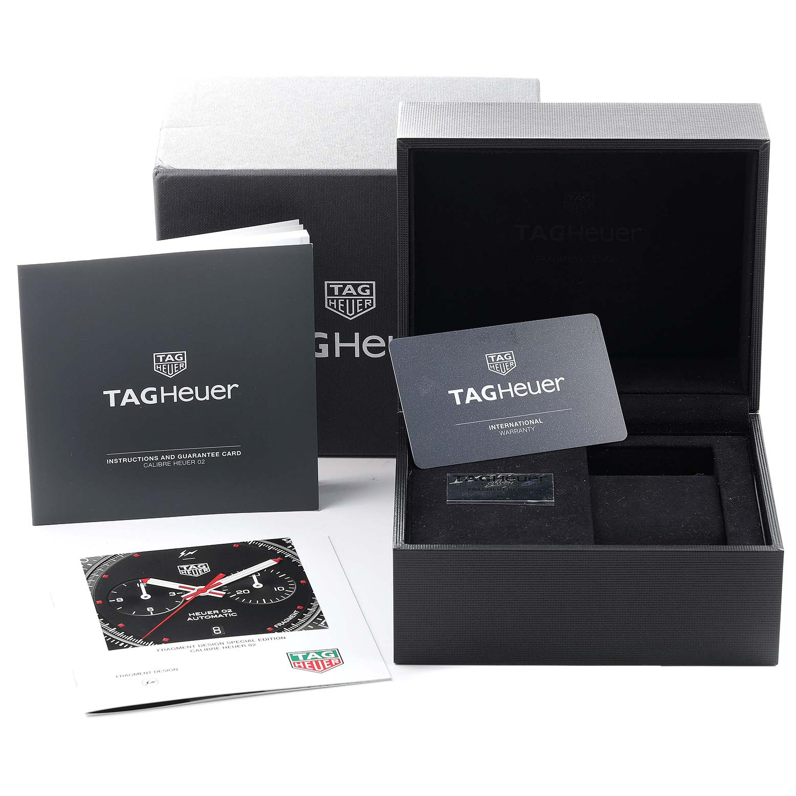 The image shows the packaging, instruction manual, guarantee card, and box for the Tag Heuer Formula 1 CAZ201A.BA0641 Men's Stainless Steel Black Dial CAZ201A.BA0641 Men's Stainless Steel Black Dial model.
