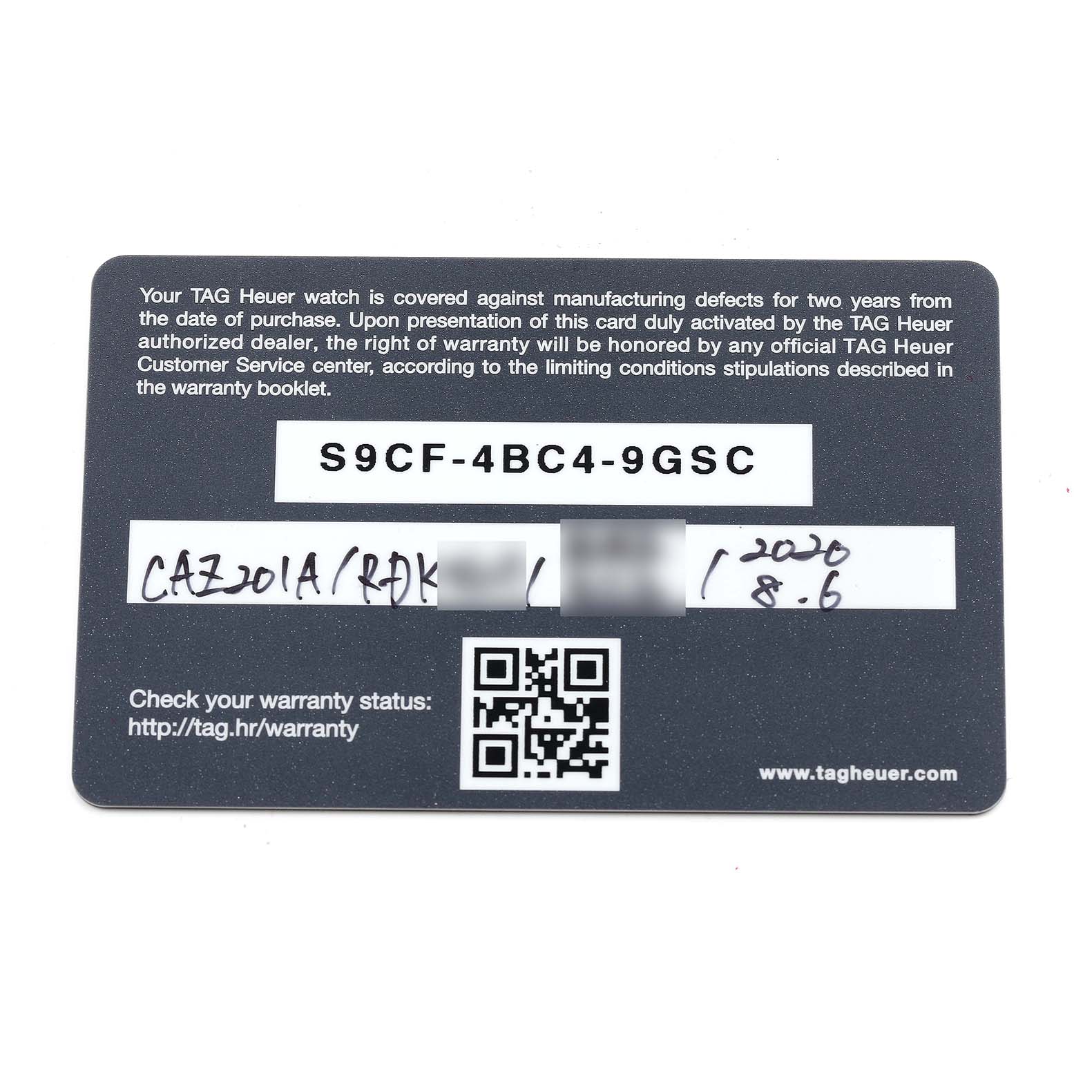 The image shows the warranty card for a Formula 1 model by Tag Heuer, displaying warranty details and a QR code.