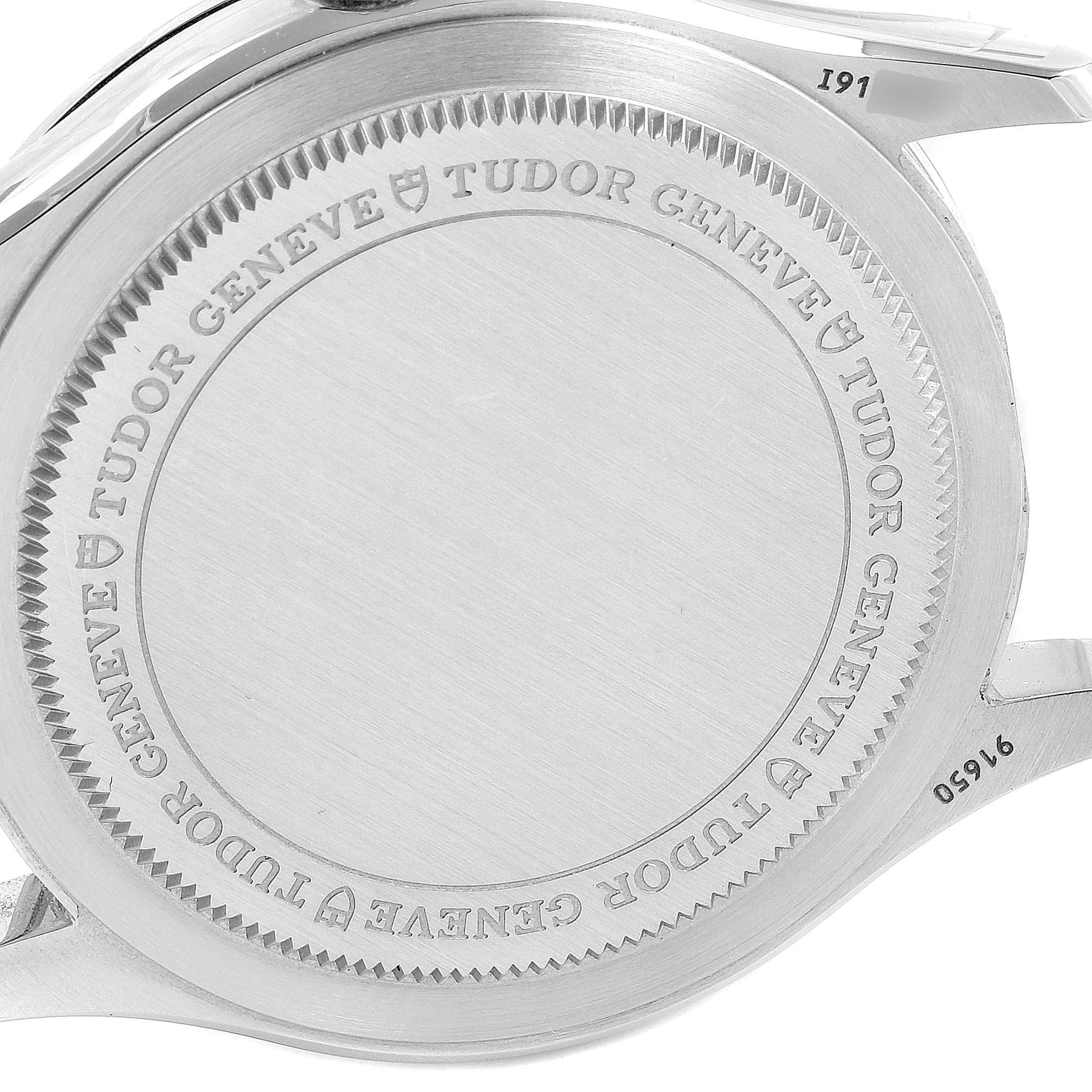 The image shows the back casing of a 1926 model watch by Tudor, highlighting the brand engraving and model details.