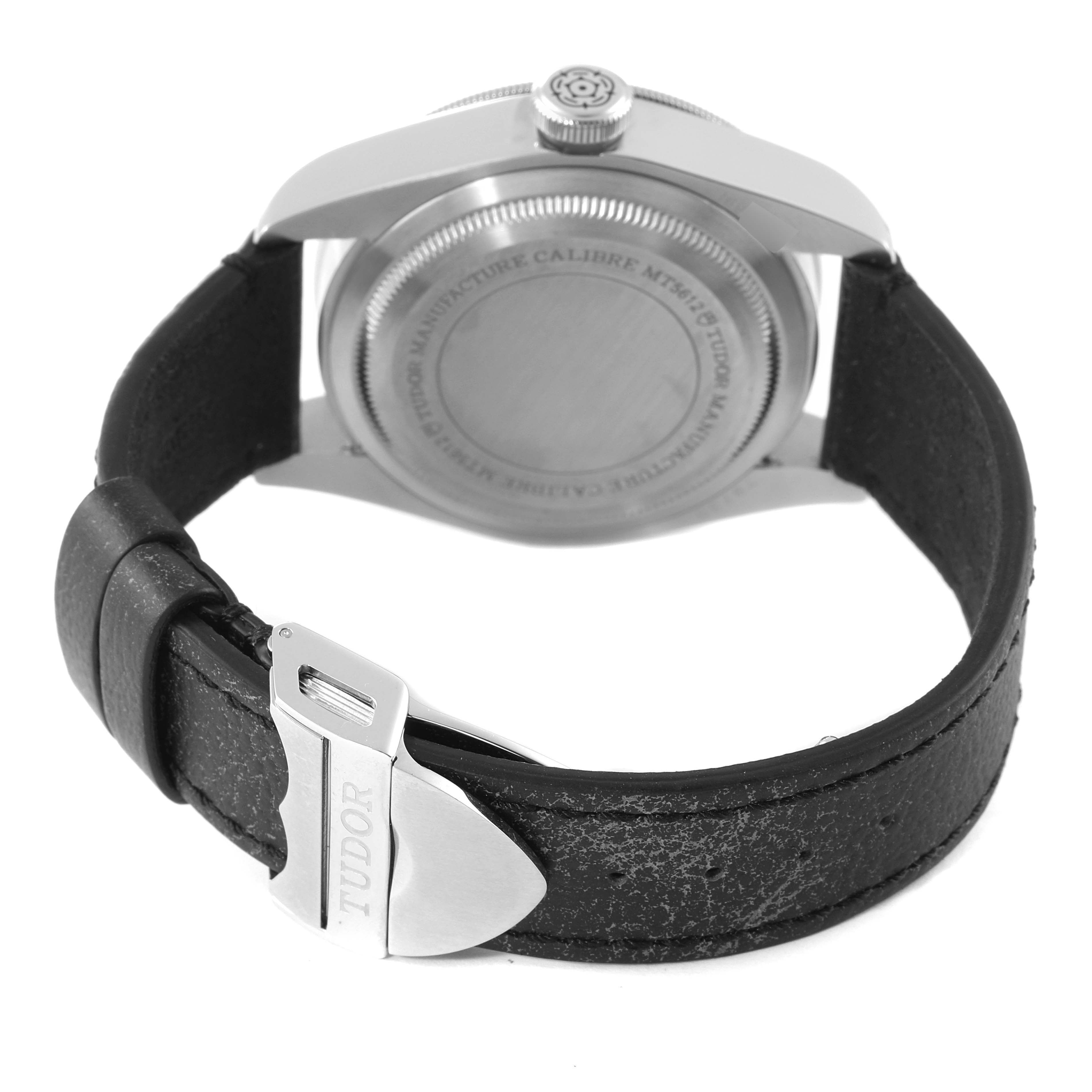 This image shows the back case and clasp of a Tudor Heritage Black Bay 55020 Men's Stainless Steel Black Dial 55020 Men's Stainless Steel Black Dial watch from an underside angle.