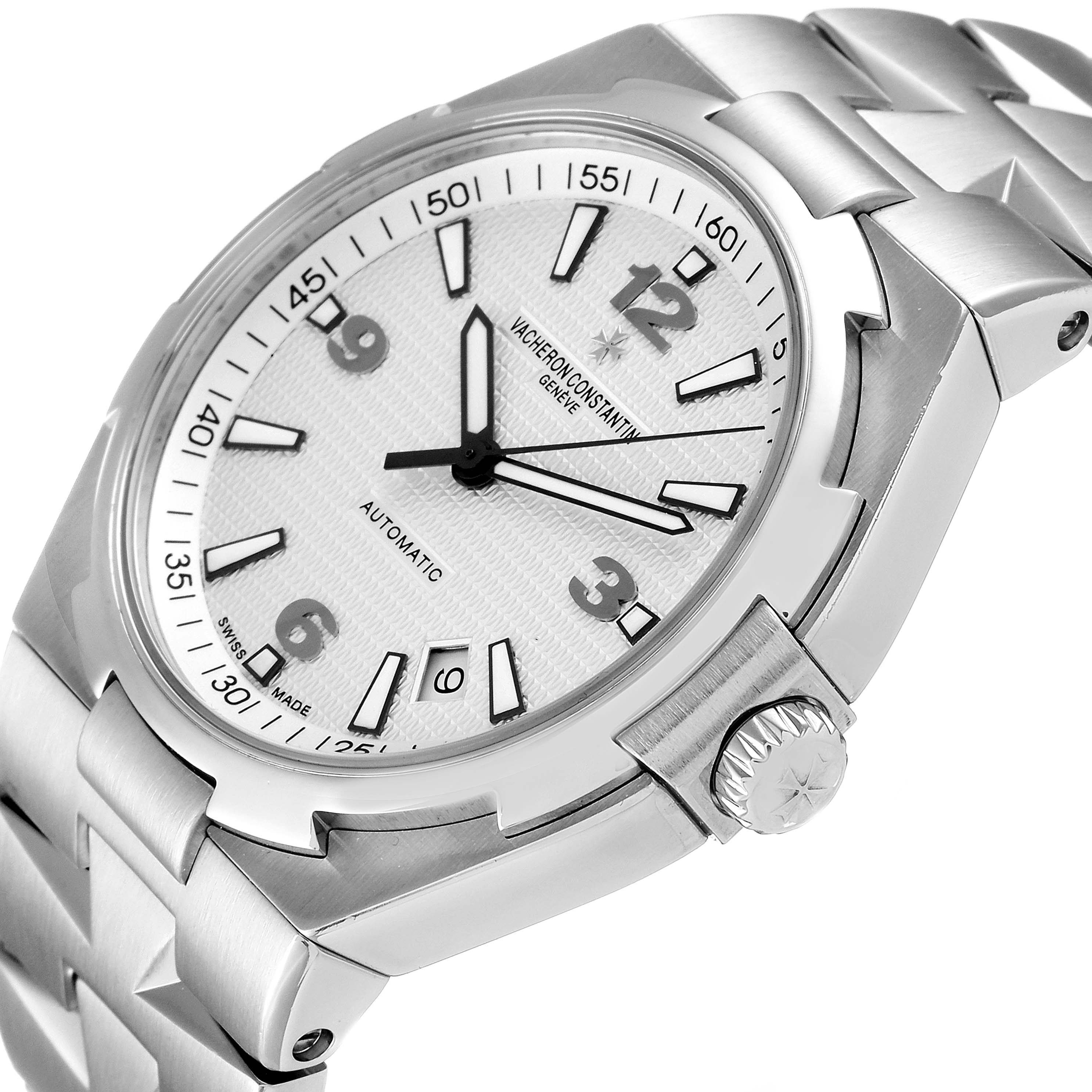 This image shows a close-up angle of the Vacheron Constantin Overseas 47040B01A-9093 Men's Stainless Steel Silver Dial 47040B01A-9093 Men's Stainless Steel Silver Dial watch, highlighting the dial, bezel, crown, and metal bracelet.