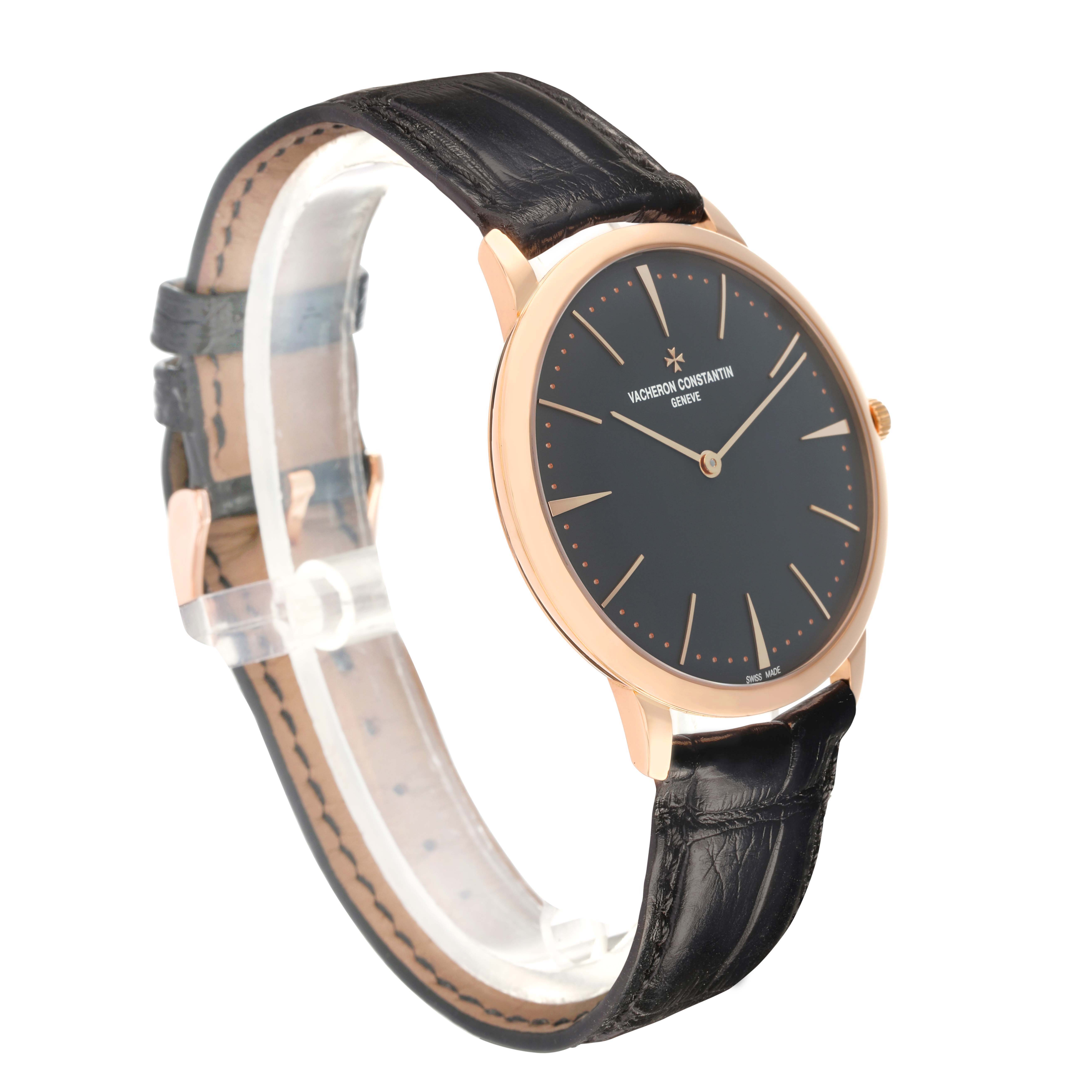 The Vacheron Constantin Patrimony 81180 Men's Rose Gold Grey Dial watch is shown at a three-quarter angle, highlighting its face, crown, and leather strap.