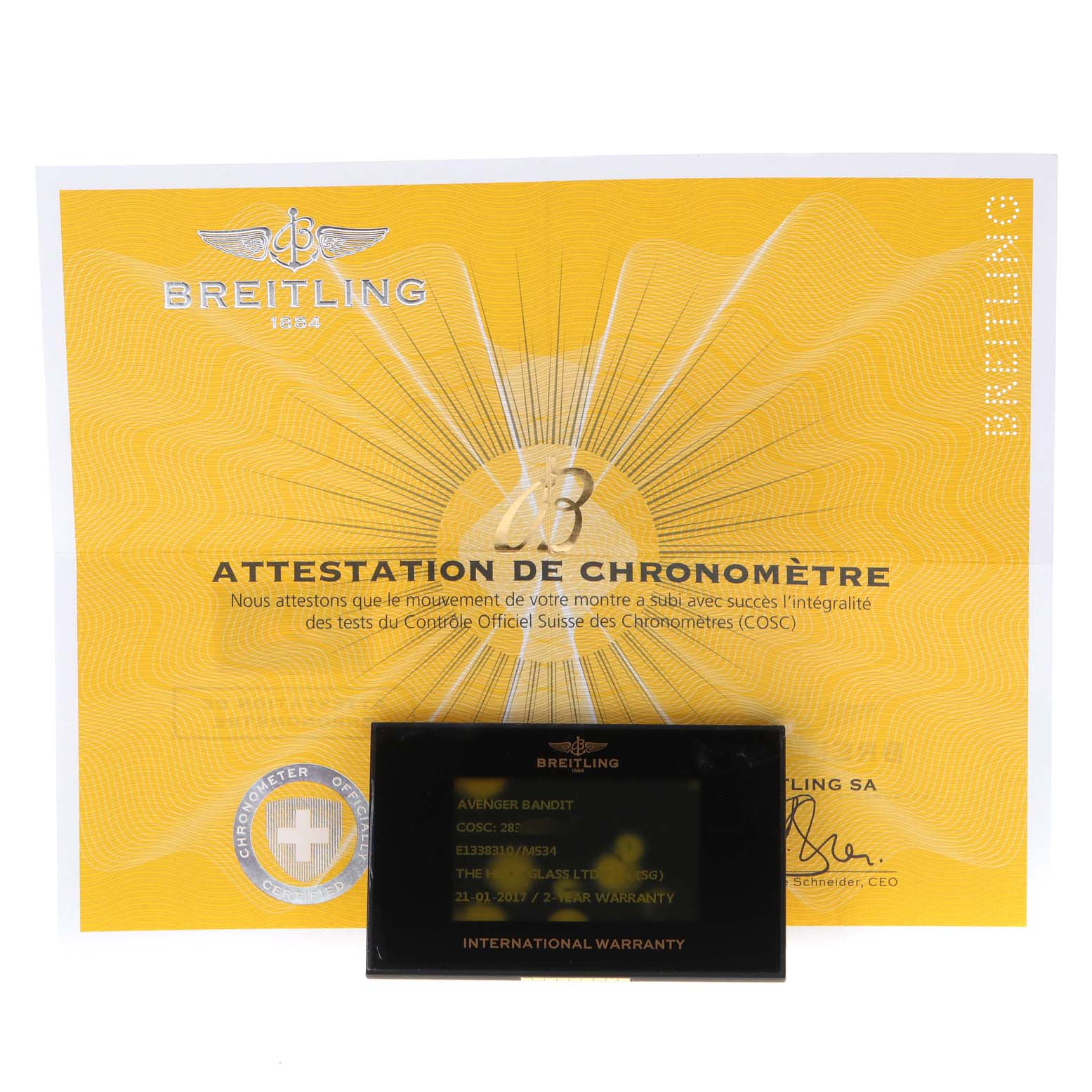 The image shows the certification and warranty card for a Breitling Avenger E1338310/M536-109W Men's Titanium Grey Dial E1338310/M536-109W Men's Titanium Grey Dial model watch.