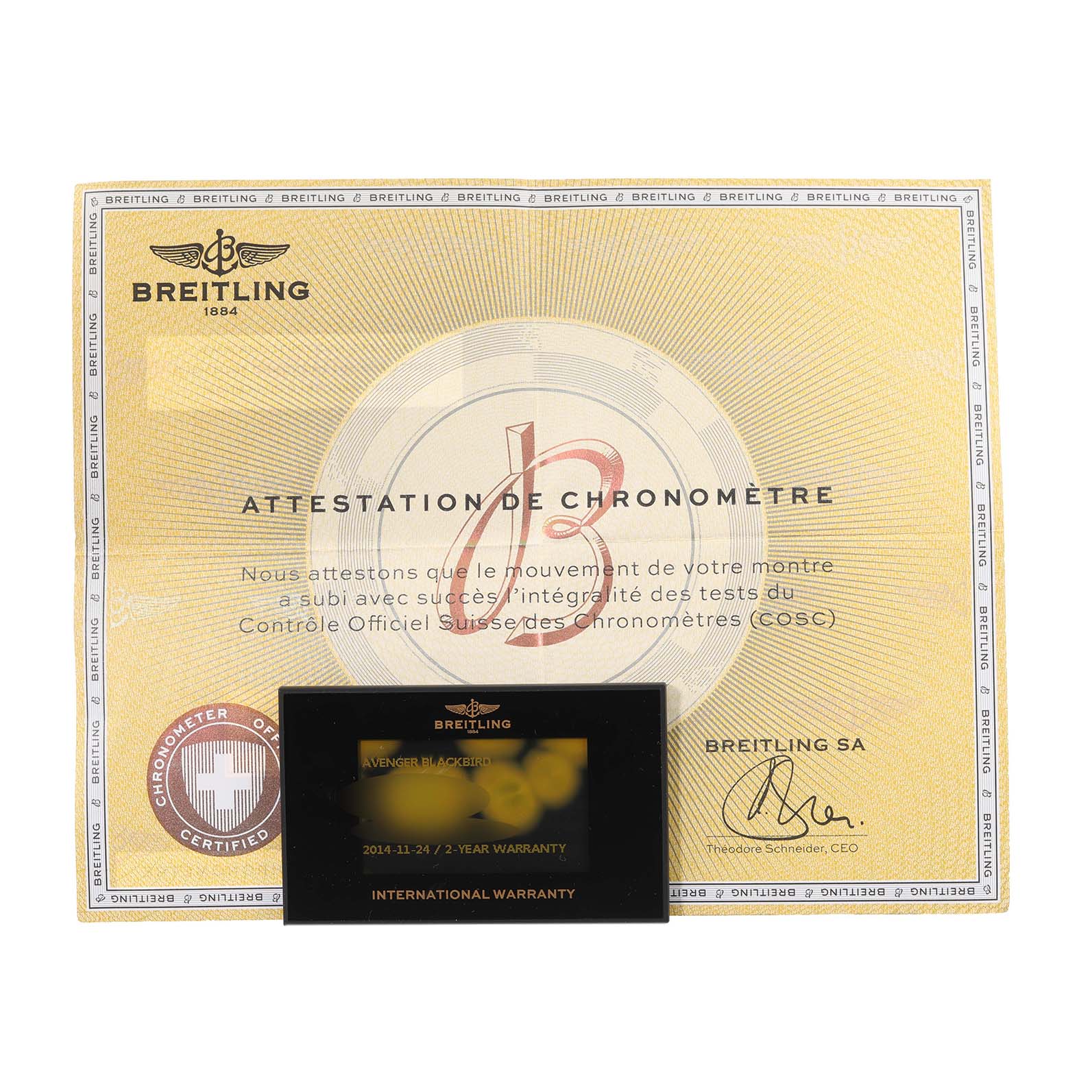 This image shows the warranty and chronometer certification for the Breitling Avenger V17310 Men's Titanium Black Dial V17310 Men's Titanium Black Dial model.