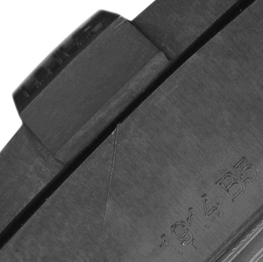 This close-up image shows the side of the Breitling Avenger V17310 Men's Titanium Black Dial V17310 Men's Titanium Black Dial model watch, highlighting the crown and part of the watch case with inscriptions.