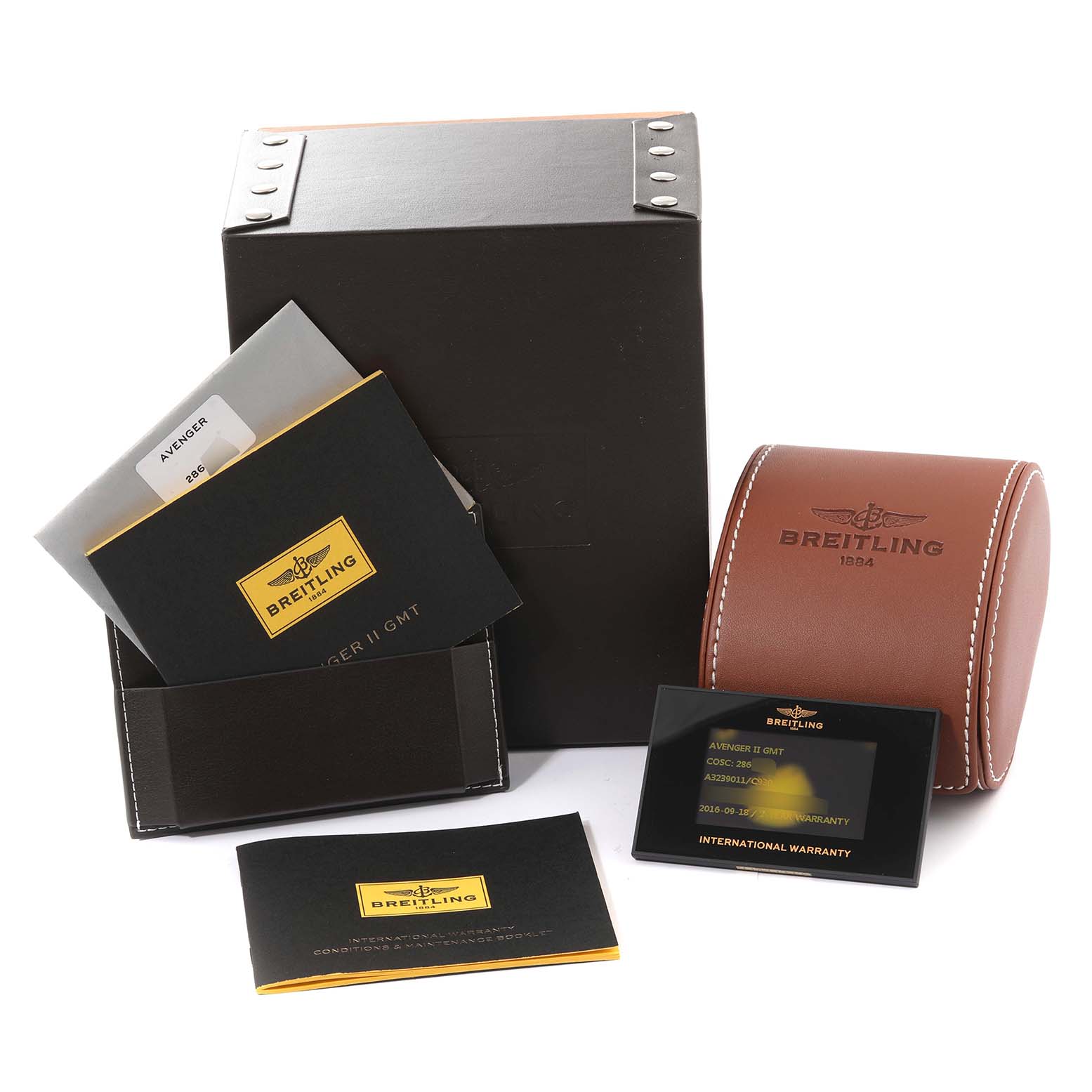 The image shows the box, warranty card, manuals, and leather travel case for the Breitling Avenger A3239011/C930 Men's Stainless Steel Mother of Pearl Dial A3239011/C930 Men's Stainless Steel Mother of Pearl Dial model.