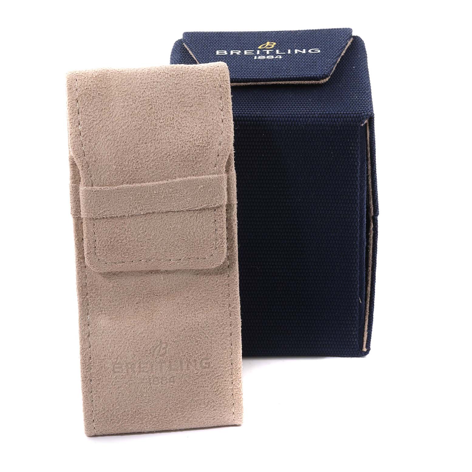 The image shows packaging accessories for the Breitling Chronomat RB0136E31Q1S1 Men's Rose Gold Brown Dial RB0136E31Q1S1 Men's Rose Gold Brown Dial model, featuring a beige suede case and a navy blue box.