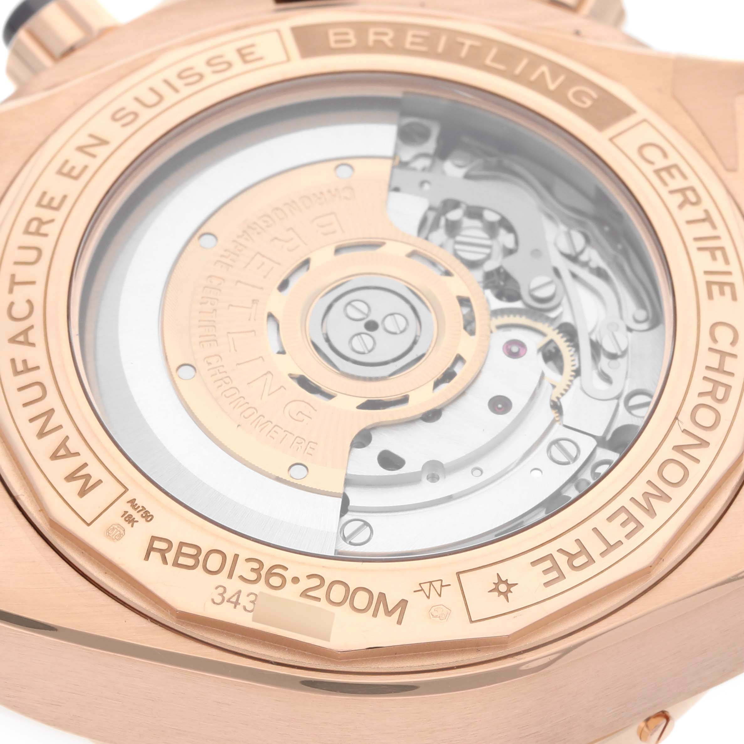 The image shows the back view of the Breitling Chronomat RB0136E31Q1S1 Men's Rose Gold Brown Dial RB0136E31Q1S1 Men's Rose Gold Brown Dial watch, highlighting its transparent case back and inner mechanical movement.