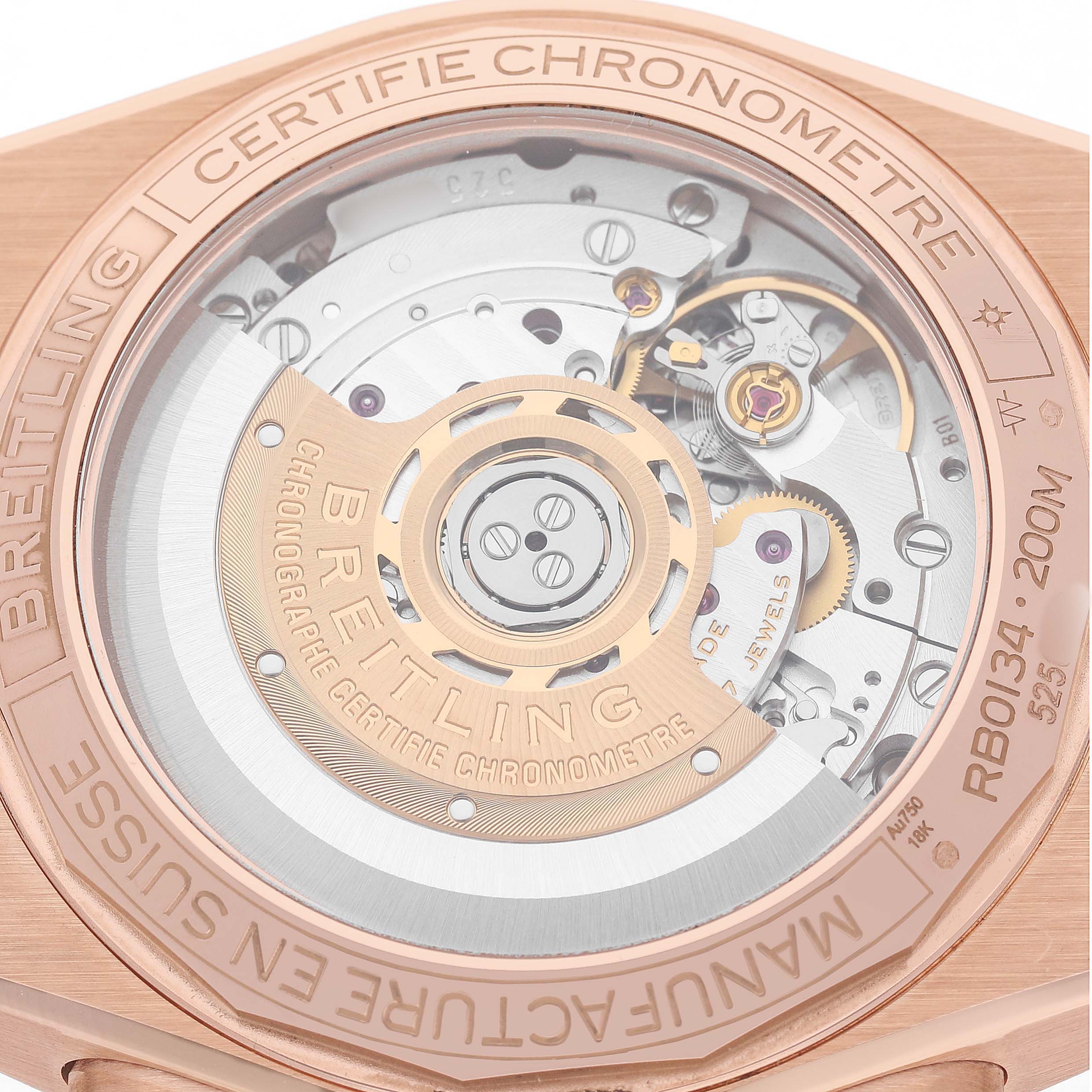 The image shows the back view of a Breitling Chronomat RB0134 Men's Rose Gold Grey Dial, displaying its mechanical movement and rotor.