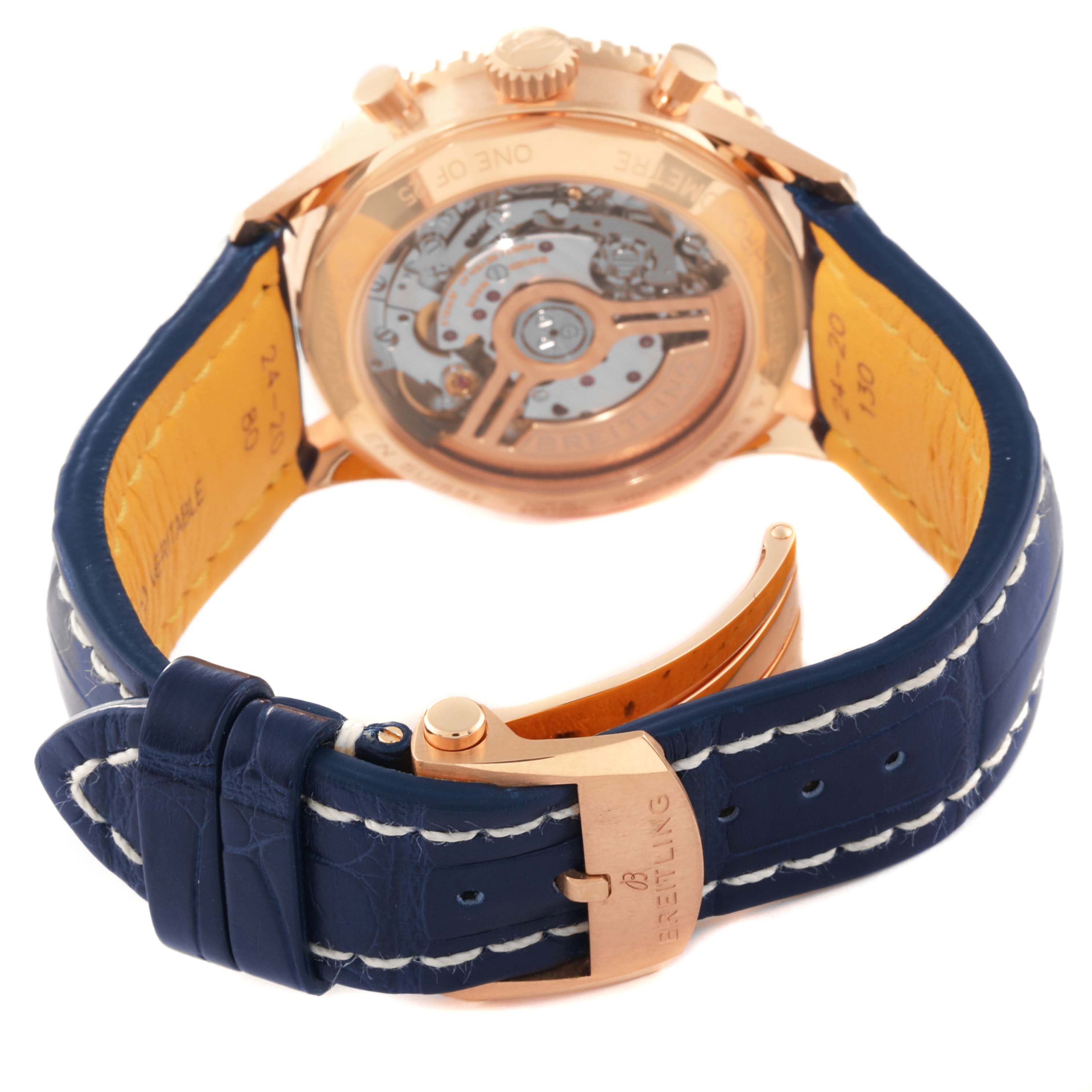 The image shows the back view of the Breitling Limited Series watch with a visible mechanism and blue leather strap.