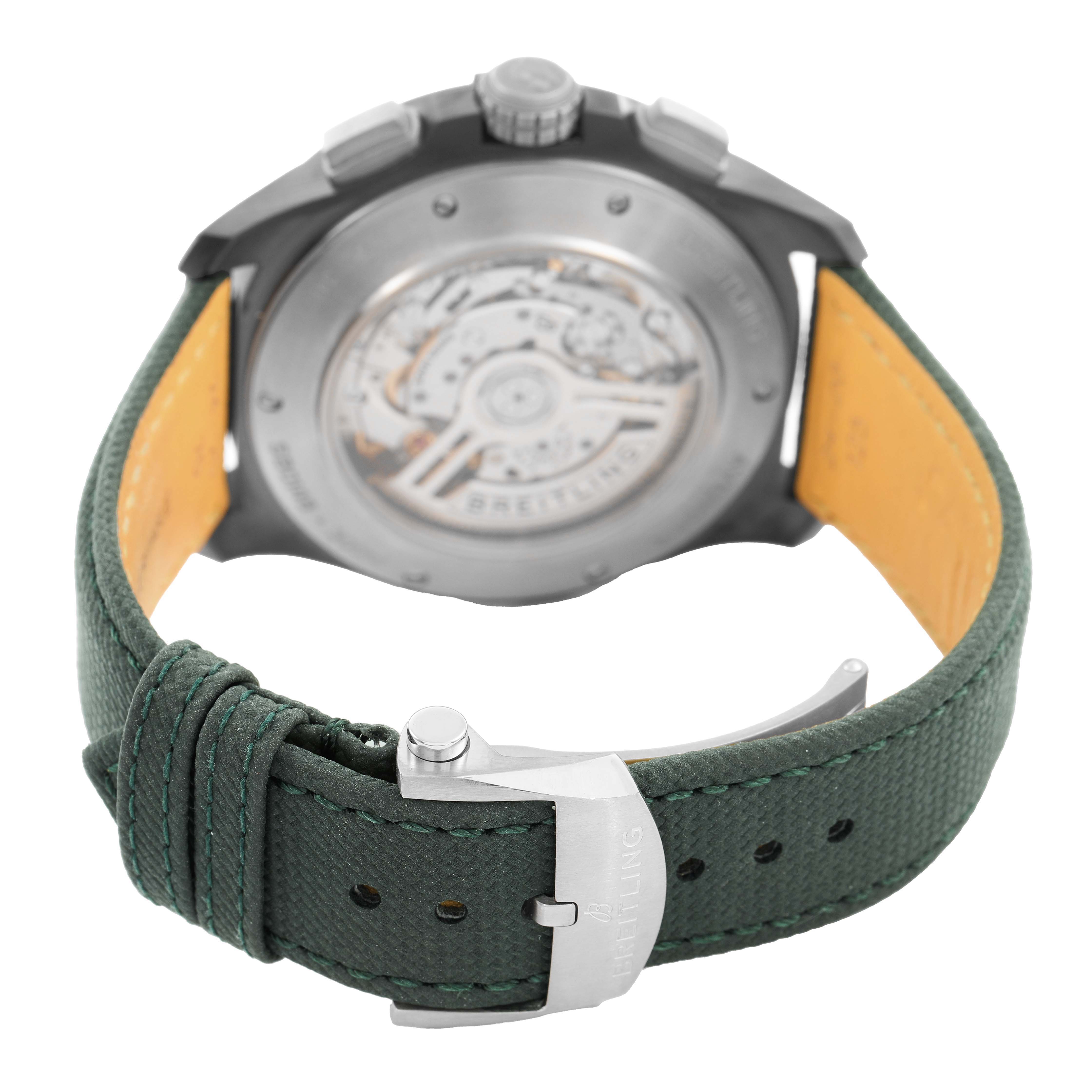 The Breitling Avenger SB0148 Men's Ceramic Black Dial watch is shown from the back, highlighting the movement and green strap with clasp.