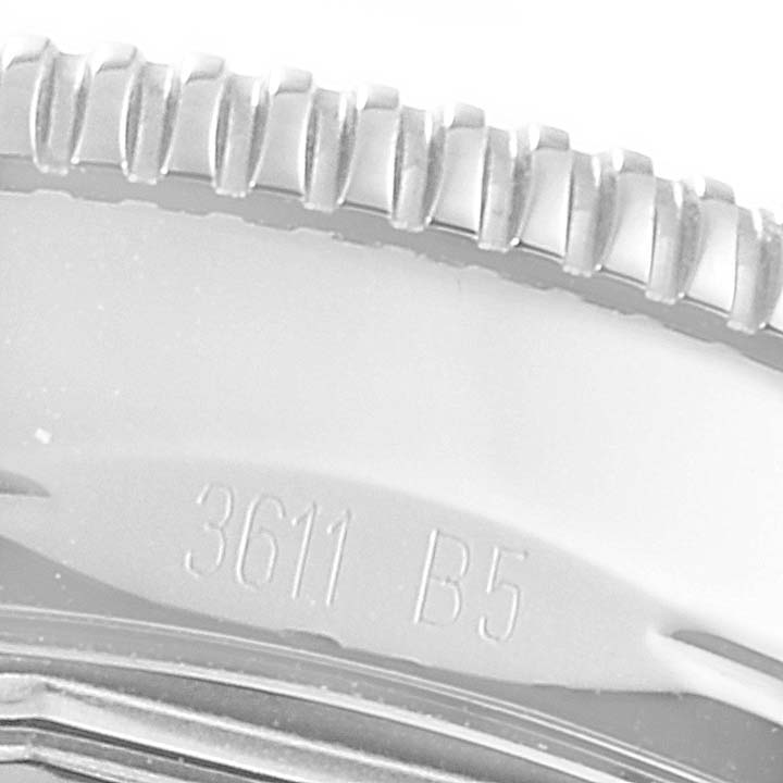 This image shows a close-up of the bezel and engraved serial number on the Breitling Superocean A17321 Men's Stainless Steel Black Dial A17321 Men's Stainless Steel Black Dial watch.