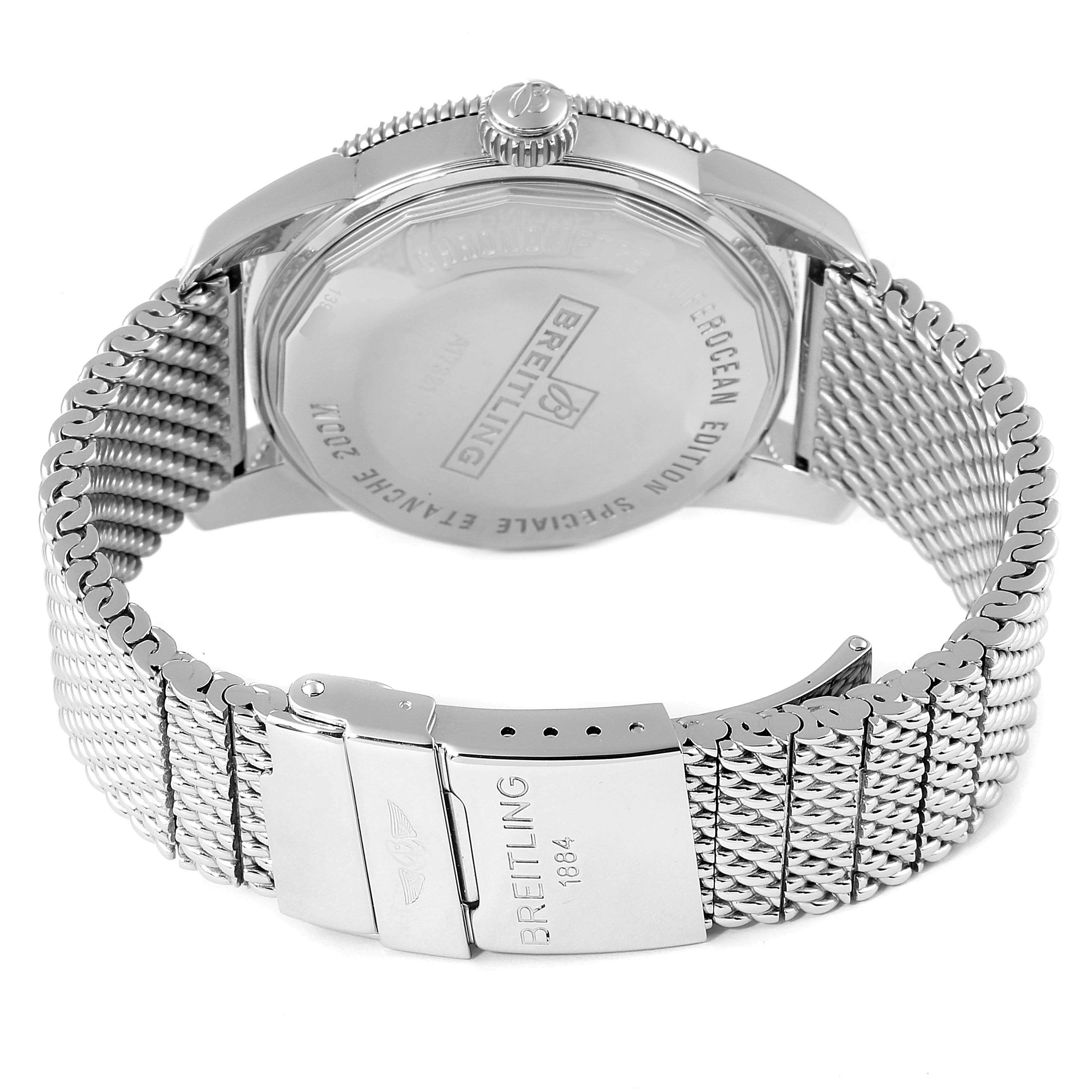 The image shows the back view of a Breitling Superocean A17321 Men's Stainless Steel Black Dial A17321 Men's Stainless Steel Black Dial model, including its case back, crown, and mesh bracelet with clasp.