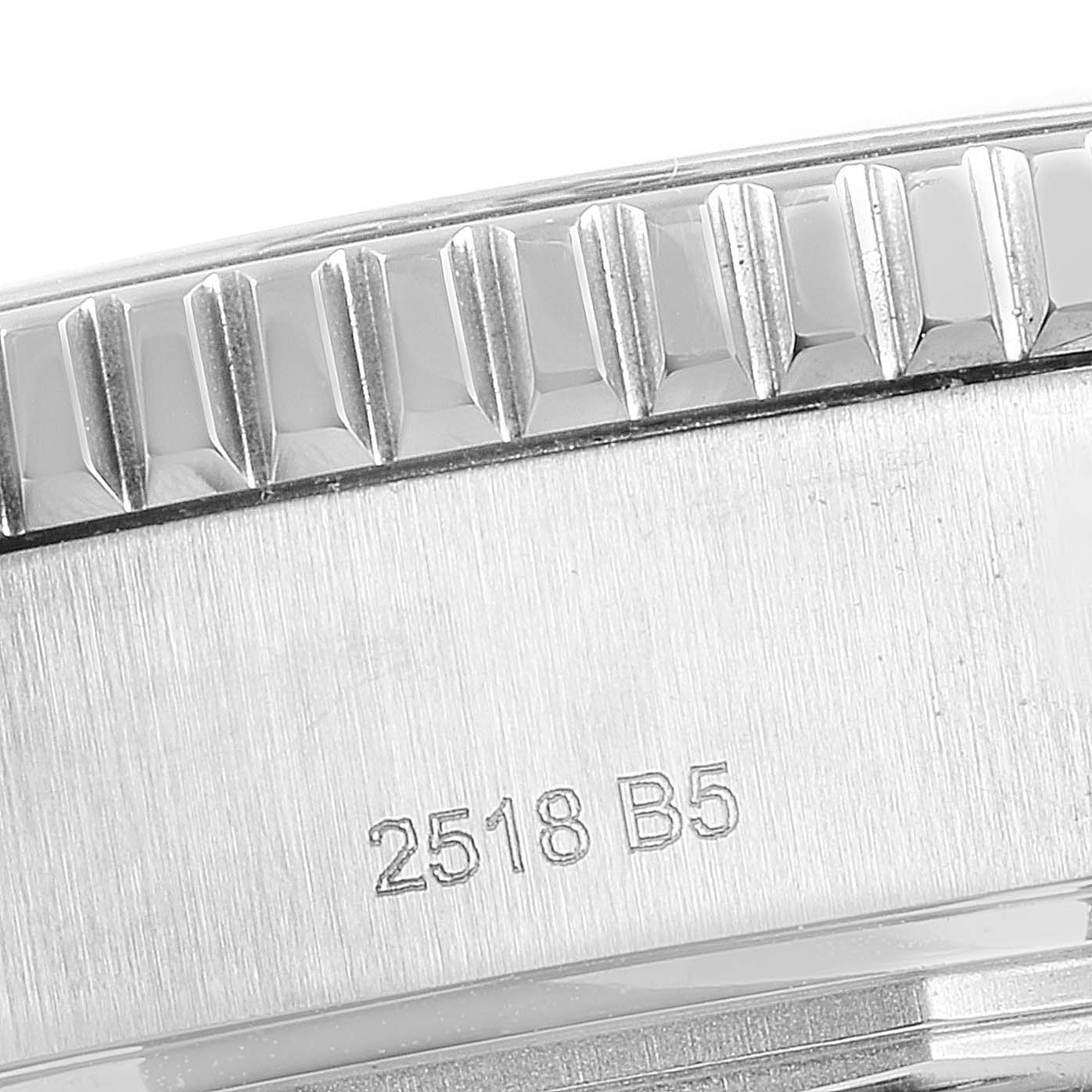 This close-up angle of the Breitling Superocean A17392 Men's Stainless Steel Blue Dial A17392 Men's Stainless Steel Blue Dial watch shows the side of the bezel and part of the case with engraved markings.