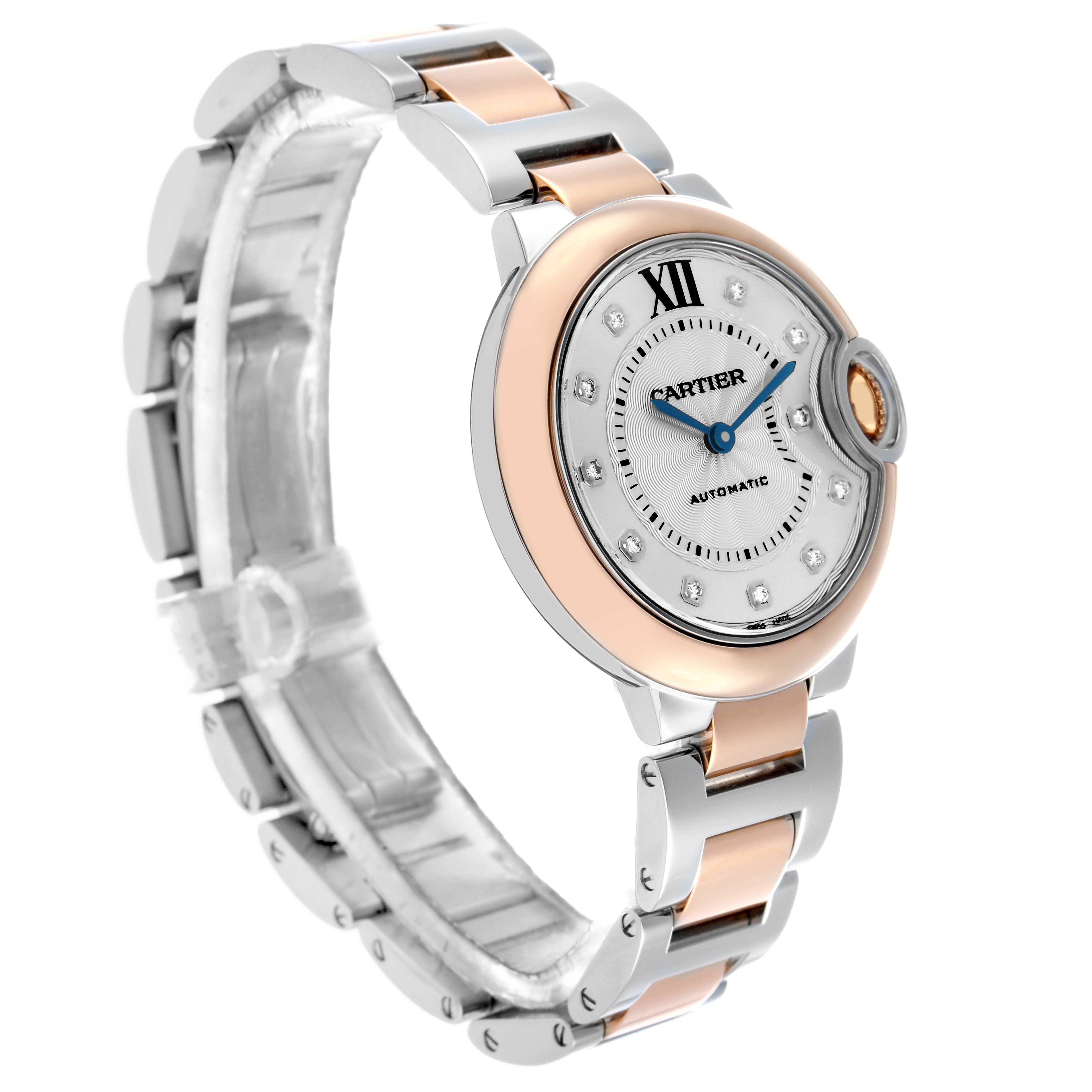 The Ballon Bleu by Cartier is shown from an angled side view, highlighting its round face, Roman numerals, and two-tone bracelet.