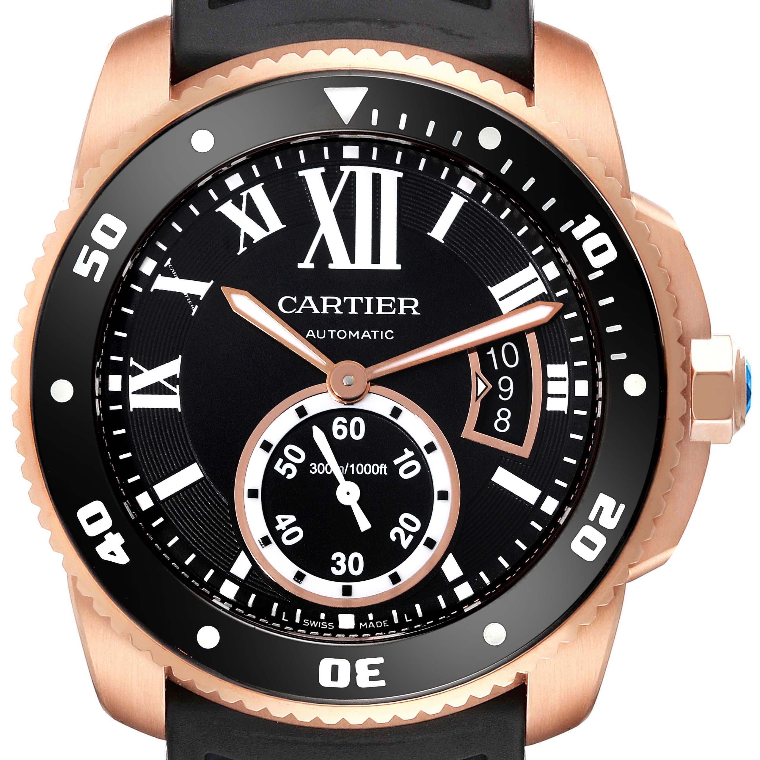 The image shows the face of a Calibre de Cartier watch by Cartier from a front angle, highlighting its dial, hands, and bezel.