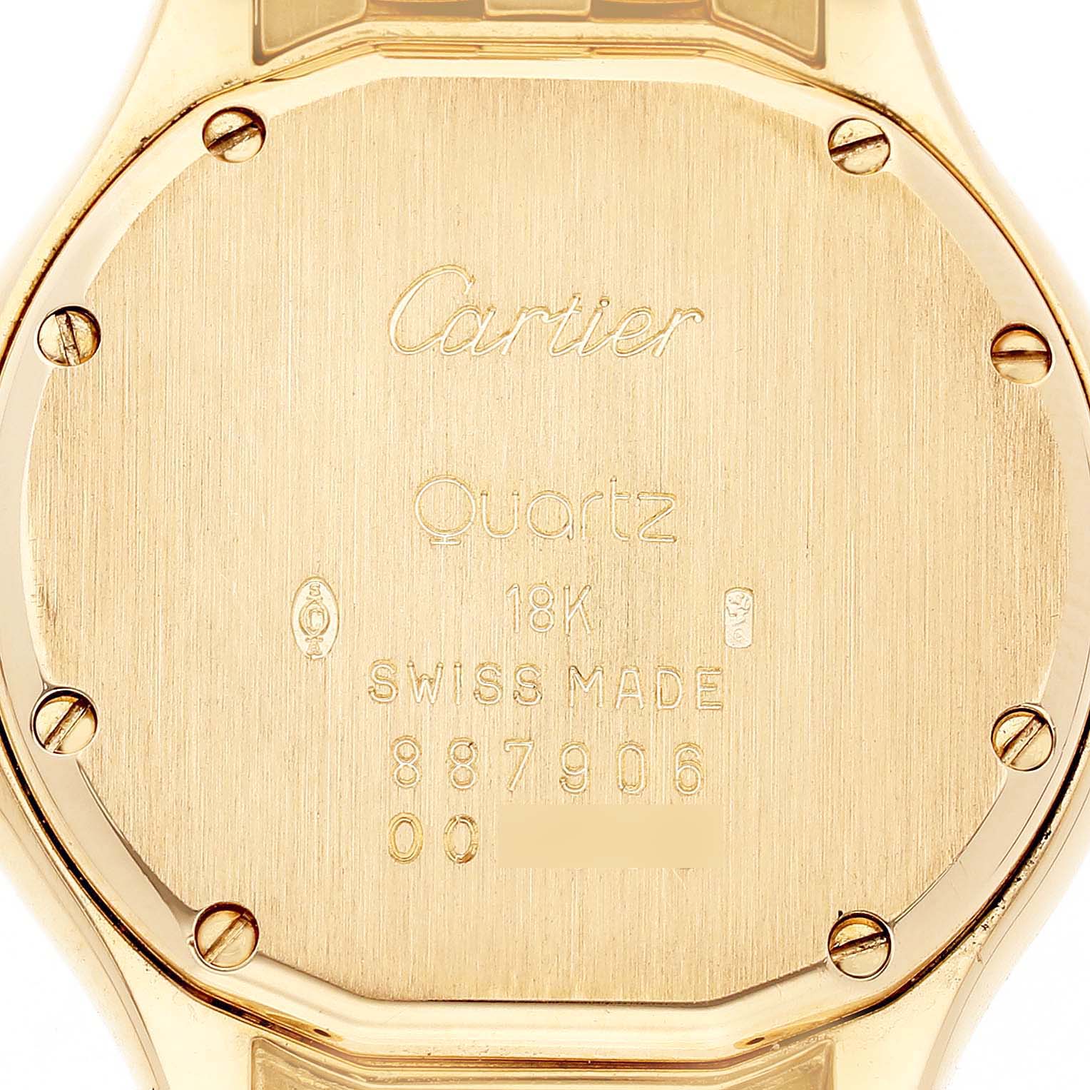 The image shows the back case of a Cartier Panthere 887906 Women's Yellow Gold Silver Dial watch, highlighting its engravings and screws.