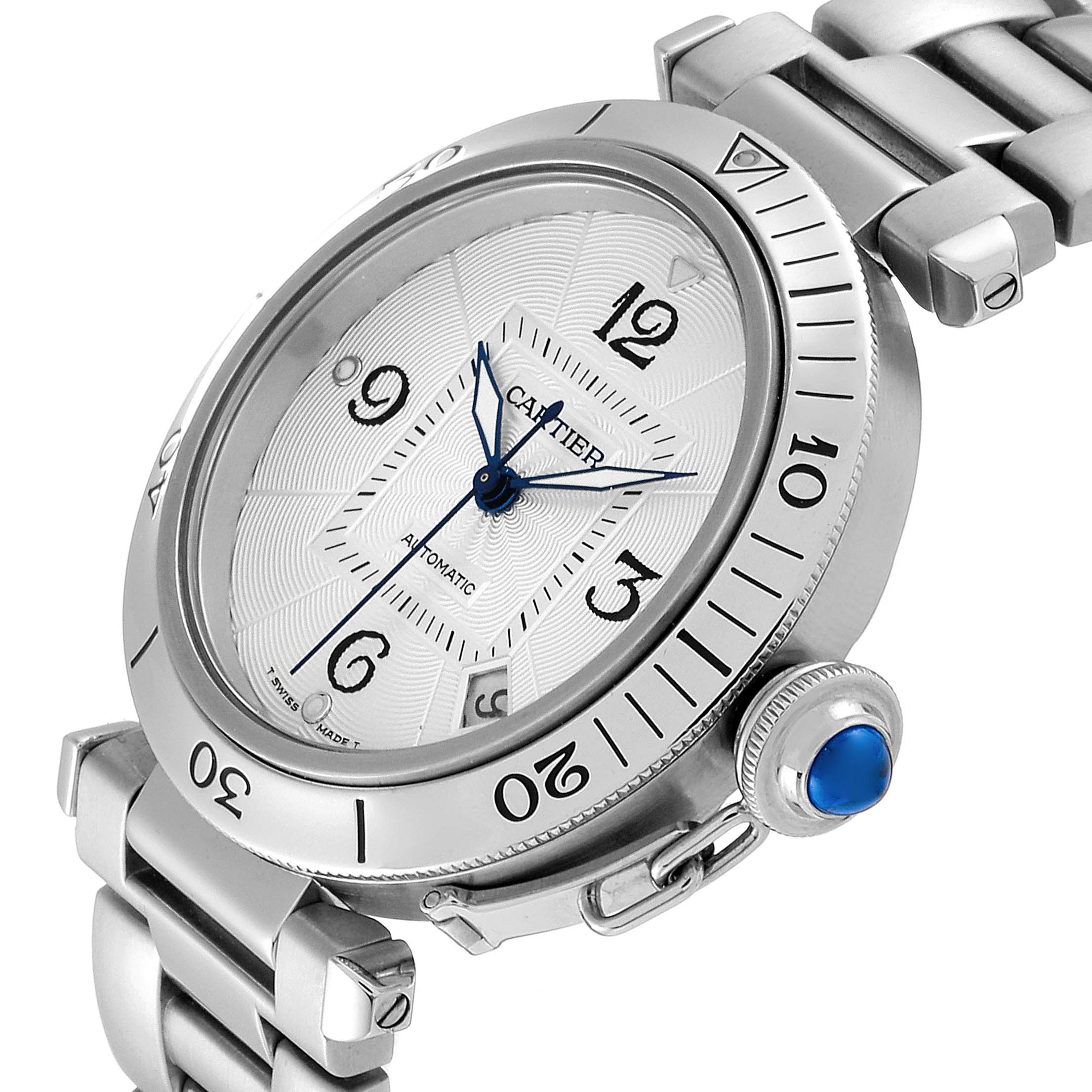 The image shows a close-up angle of the face and the crown of a Cartier Pasha W31059H3 Men's Stainless Steel Silver Dial W31059H3 Men's Stainless Steel Silver Dial model watch.
