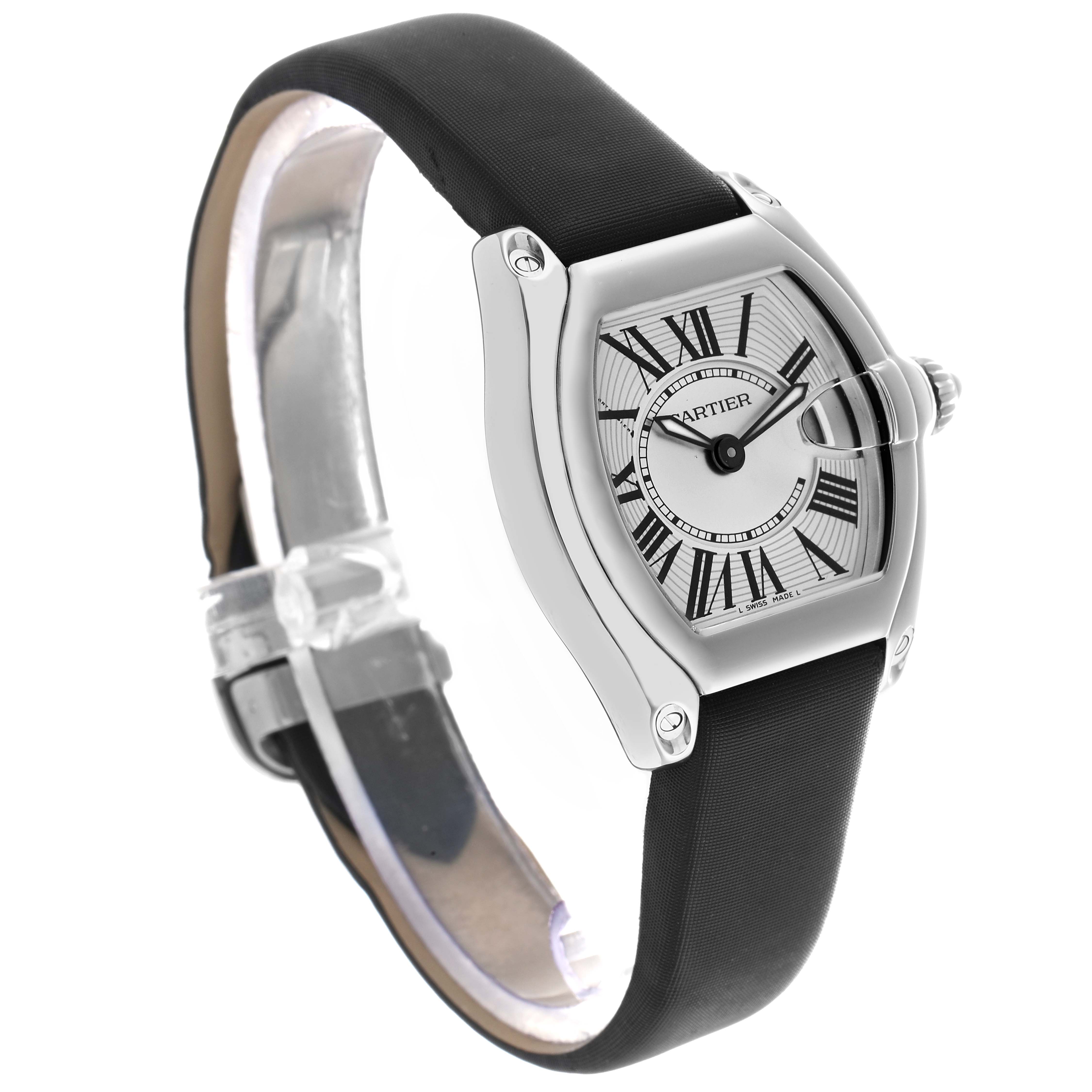 The Cartier Roadster W62016V3 Women's Stainless Steel Silver Dial watch is shown at a three-quarter angle, highlighting its face, bezel, and black strap.
