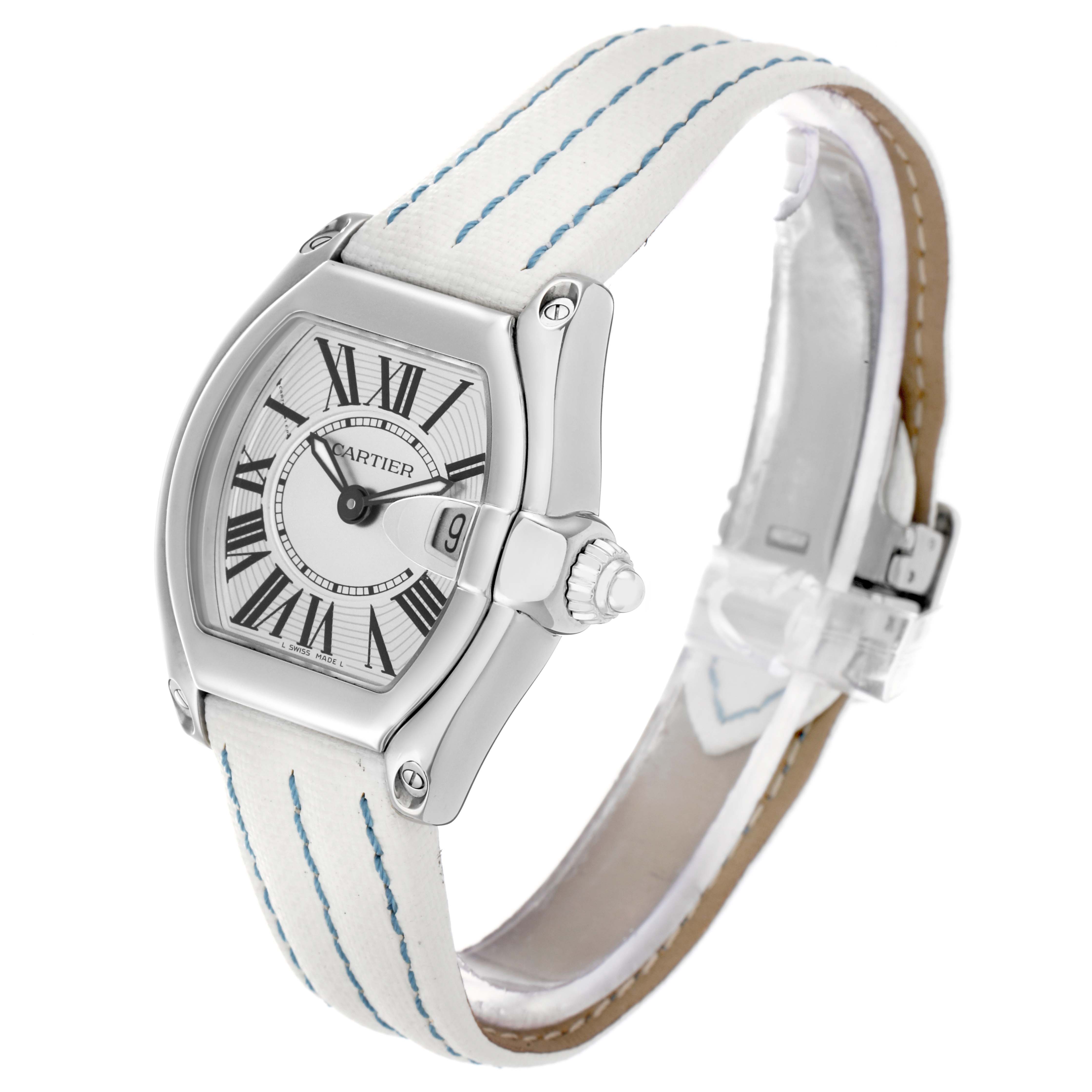 The Cartier Roadster W62016V3 Women
s Stainless Steel Silver Dial watch is shown at an angled side view, featuring its face, date window, and unique lug design.