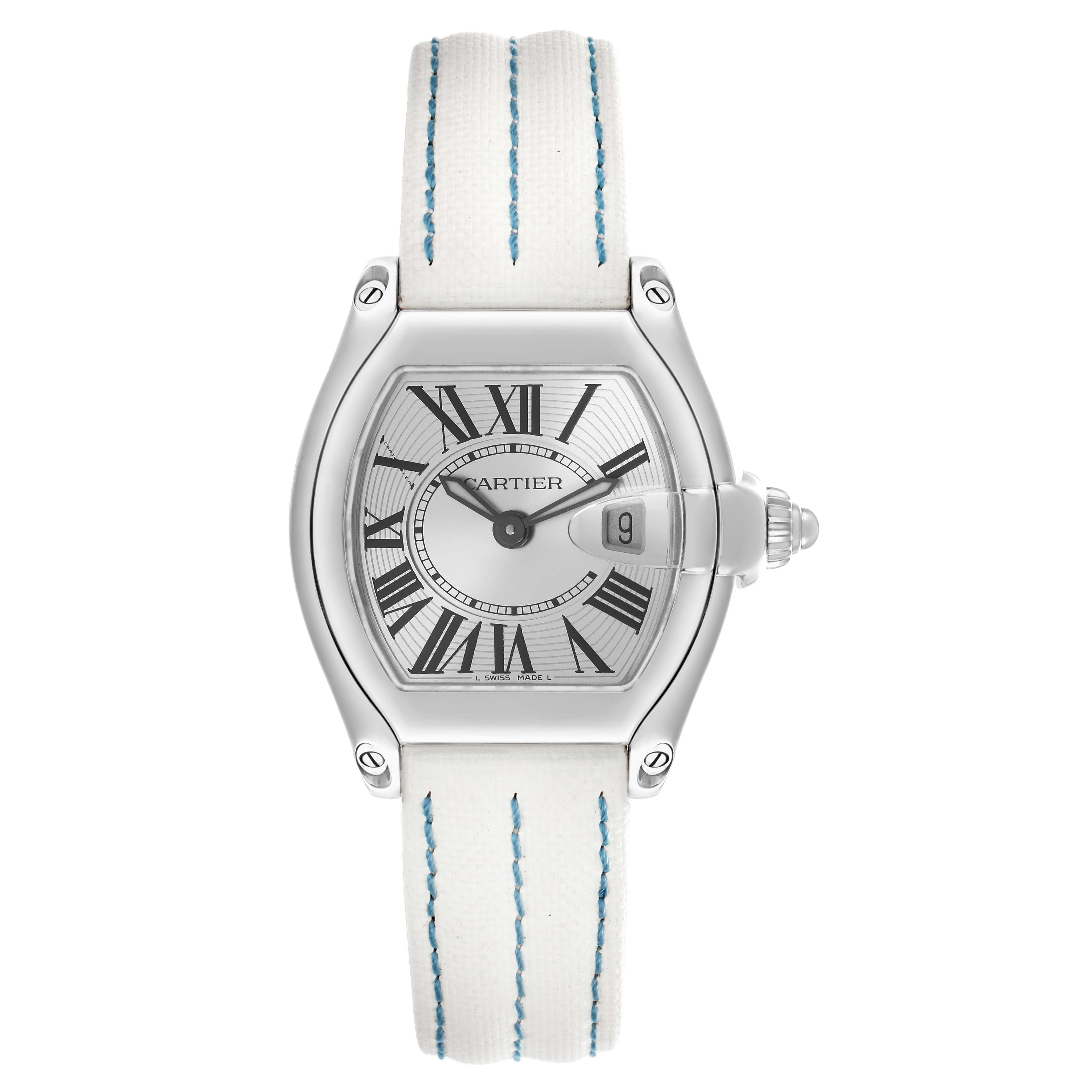 The Cartier Roadster W62016V3 Women
s Stainless Steel Silver Dial watch is shown from a front view, highlighting the dial, case, and white strap with blue stitching.