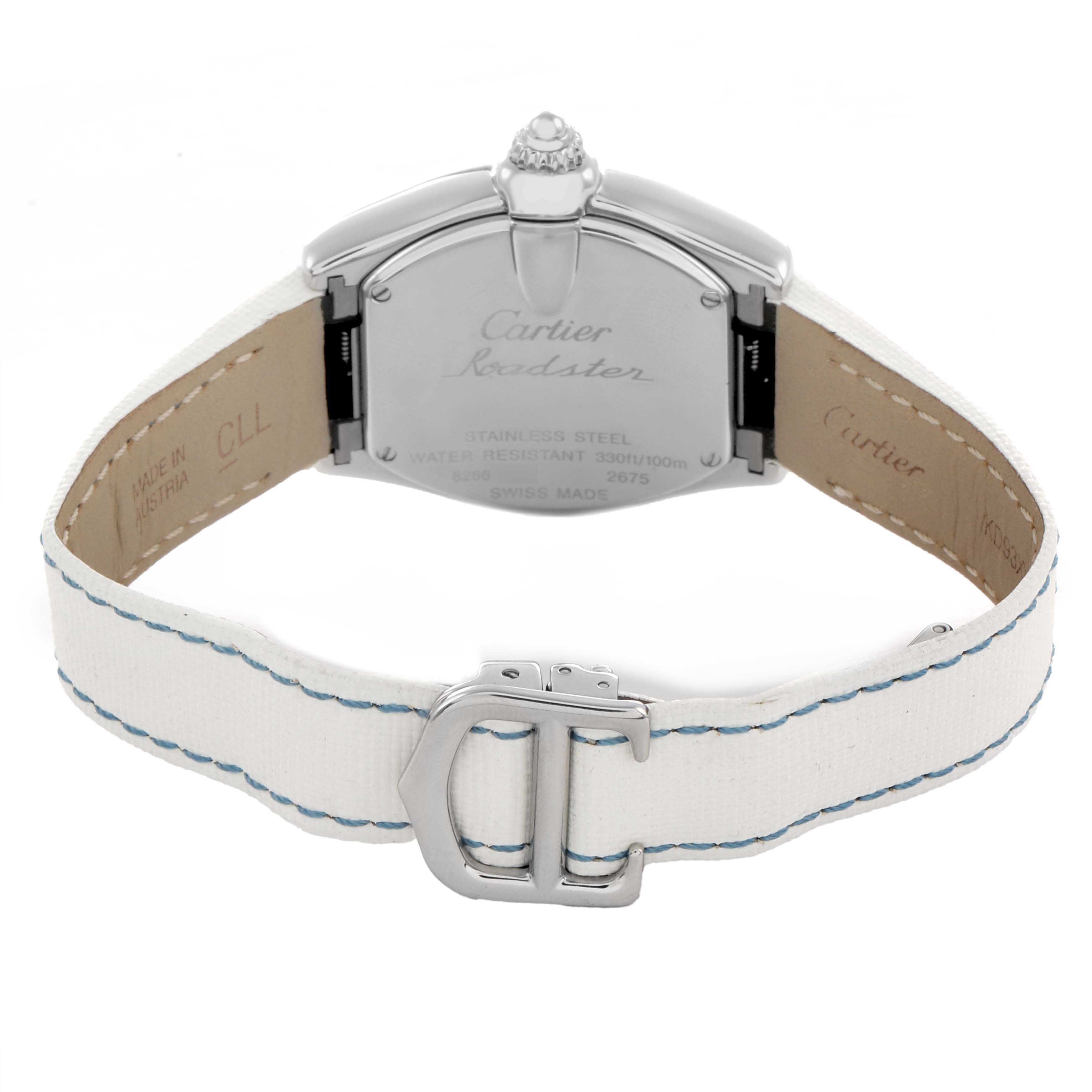 The image shows the back view of a Cartier Roadster W62016V3 Women
s Stainless Steel Silver Dial watch, highlighting the clasp, case back, and strap.