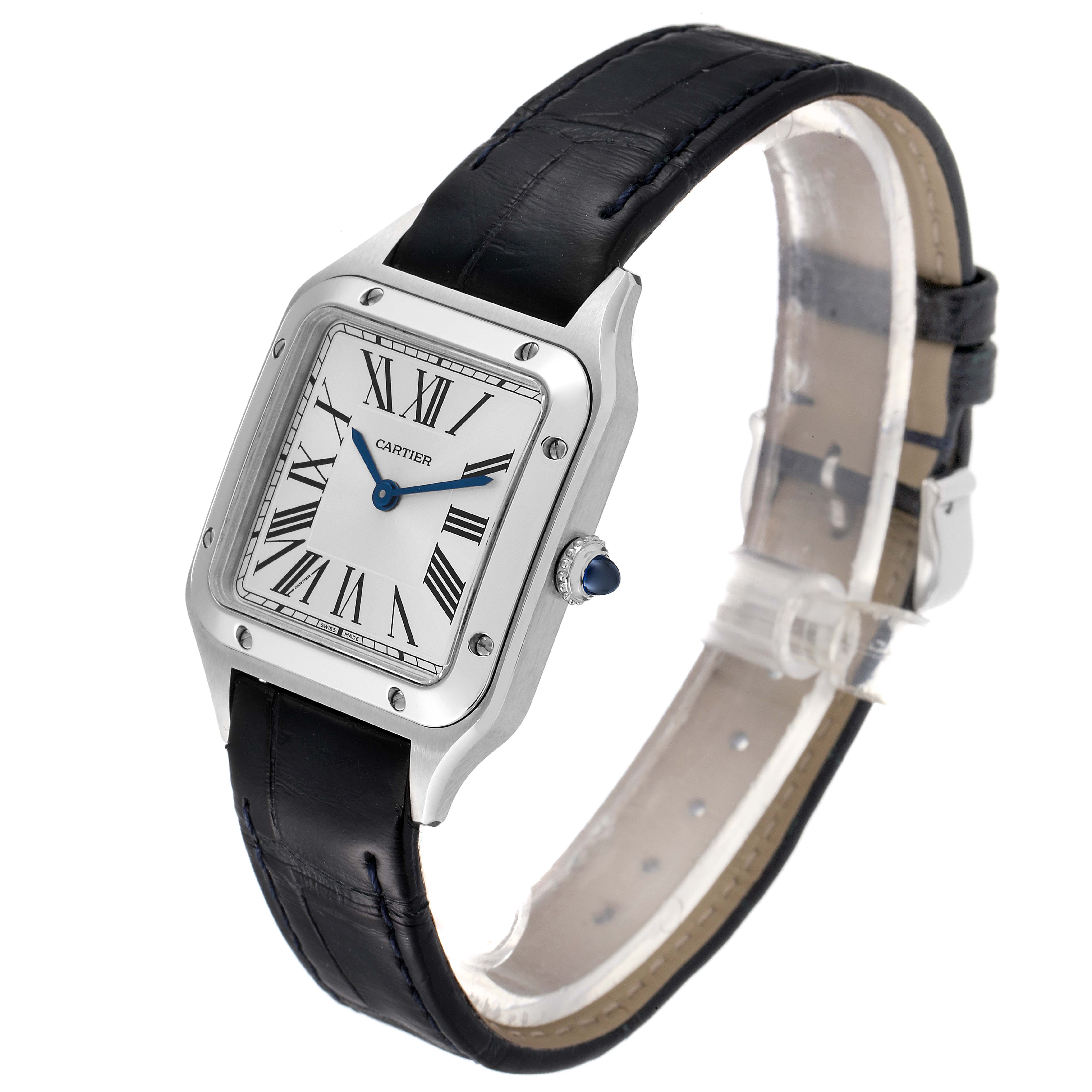 The Cartier Santos WSSA0023 Women's Stainless Steel Silver Dial WSSA0023 Women's Stainless Steel Silver Dial watch is shown at an angle highlighting its square face, black leather strap, and blue hands.