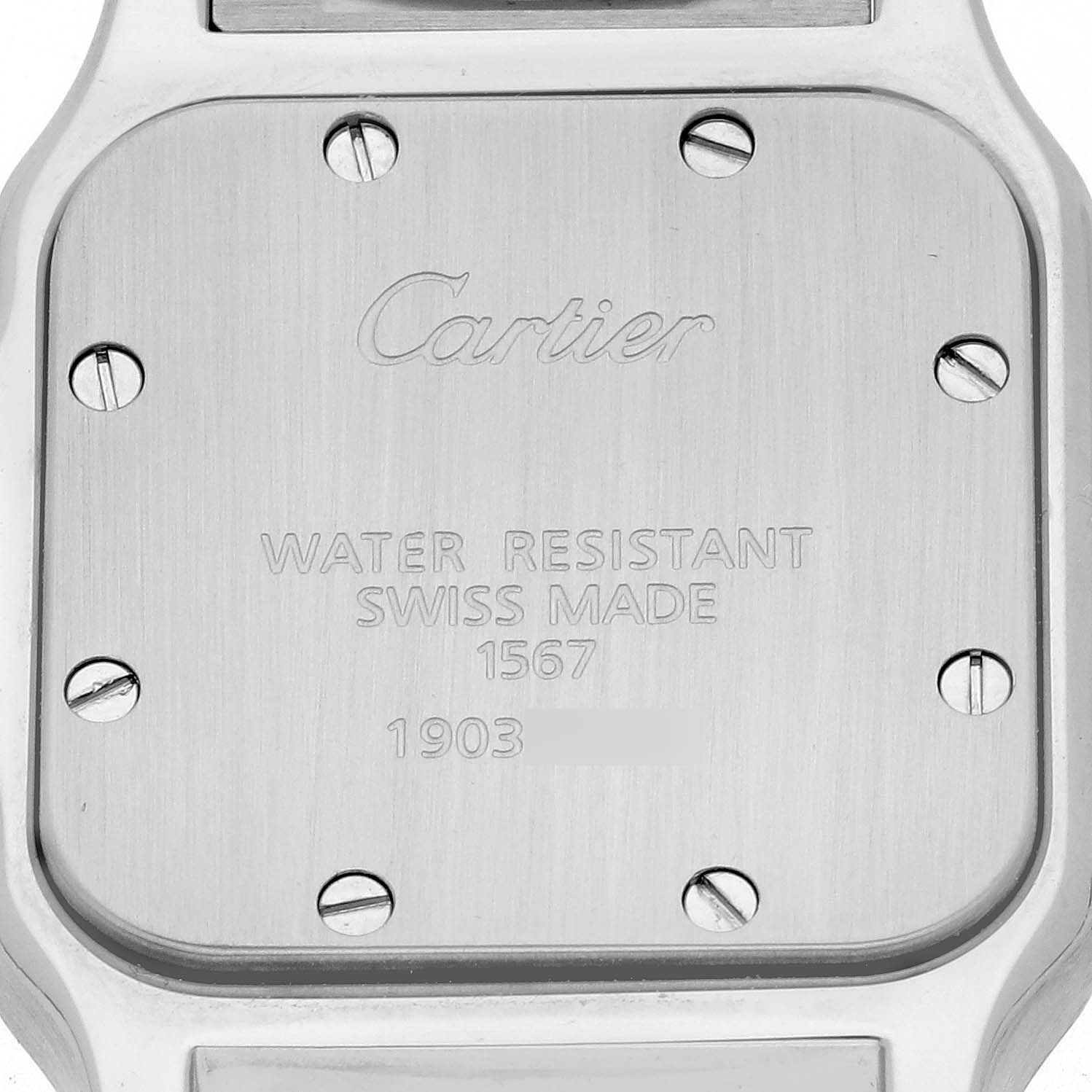 The image shows the back case of a Cartier Santos W20012C4 Women's Steel and Gold (two tone) Silver Dial W20012C4 Women's Steel and Gold (two tone) Silver Dial watch, highlighting its screws and engraved details.