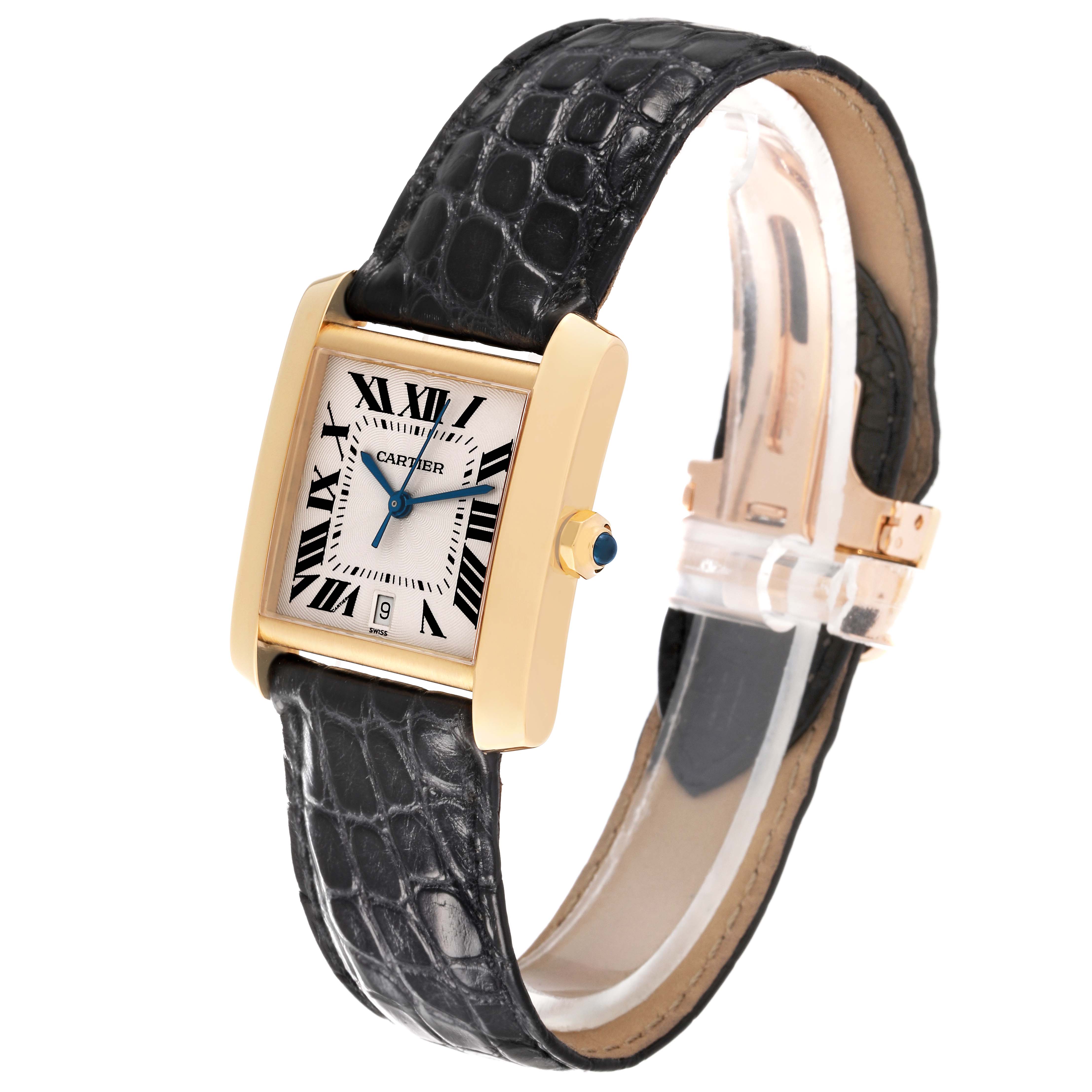 The image shows a Cartier Tank Française watch at a three-quarter angle, highlighting its rectangular gold case, black leather strap, and Roman numeral dial.