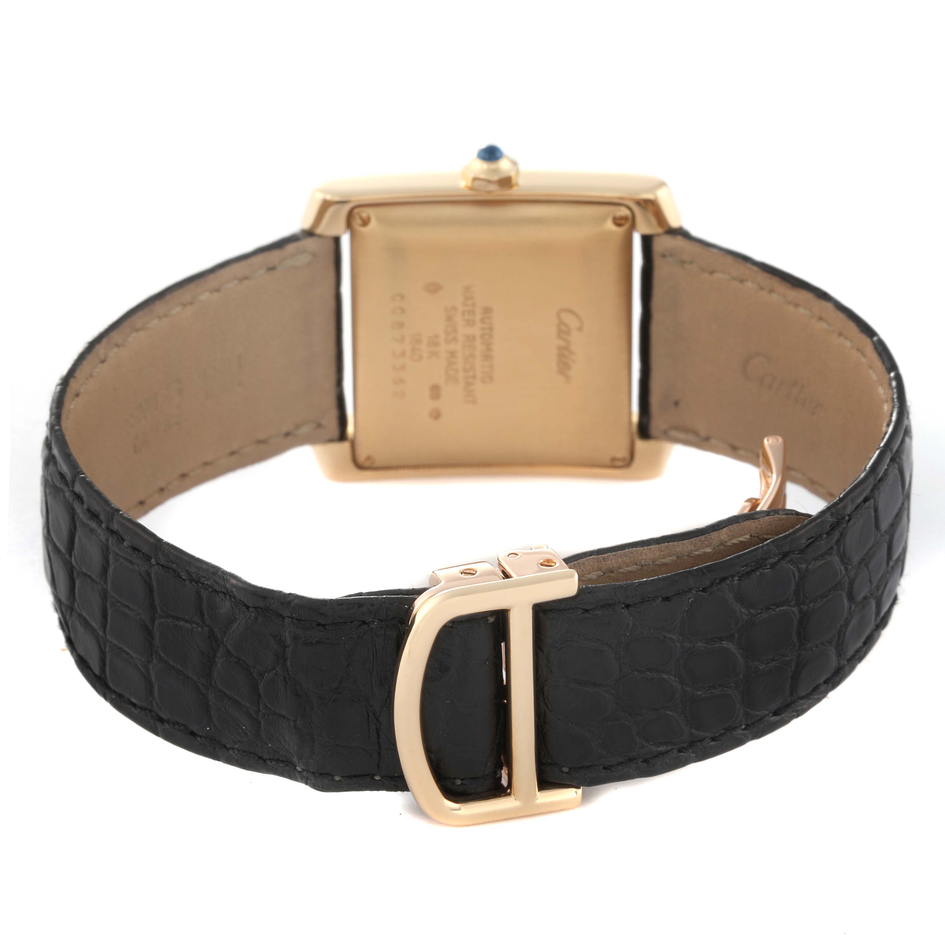 The image shows the back view of a Cartier Tank Francaise W5000156 Men's Yellow Gold Silver Dial W5000156 Men's Yellow Gold Silver Dial watch, highlighting the case back, strap, and buckle.