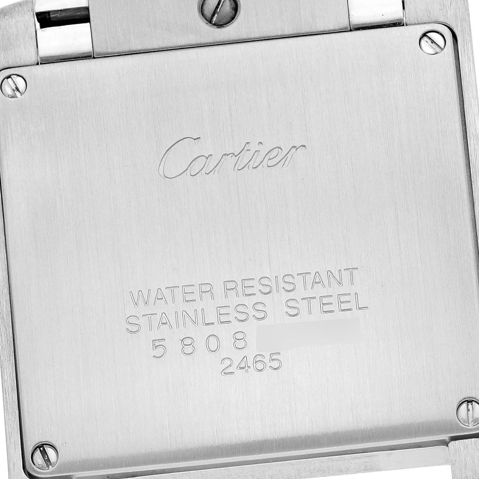 This image shows the back case of a Cartier Tank Française watch, highlighting its water resistance and stainless steel material.