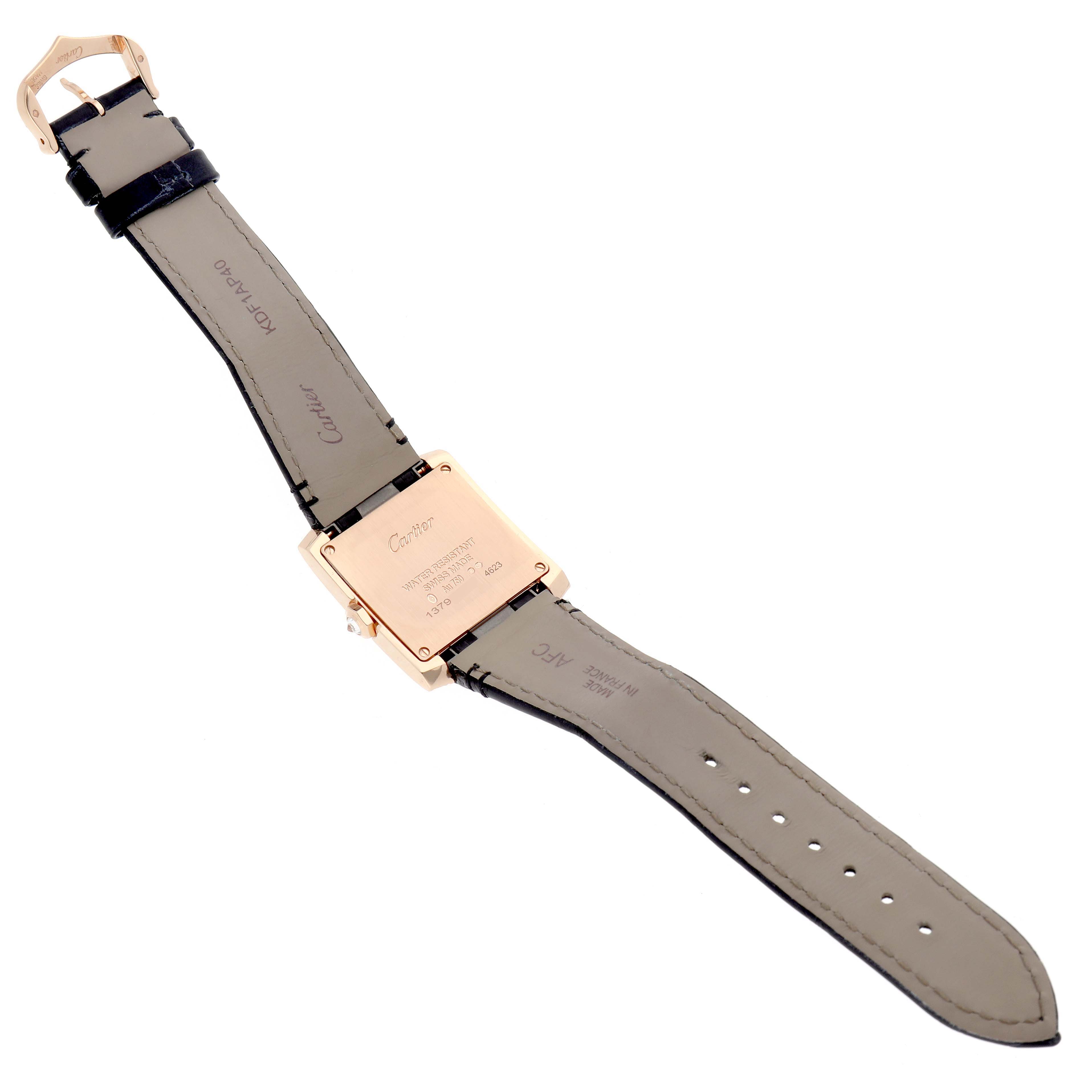 The image shows the back of a Cartier Tank Française watch, displaying the clasp and strap from a top-down angle.