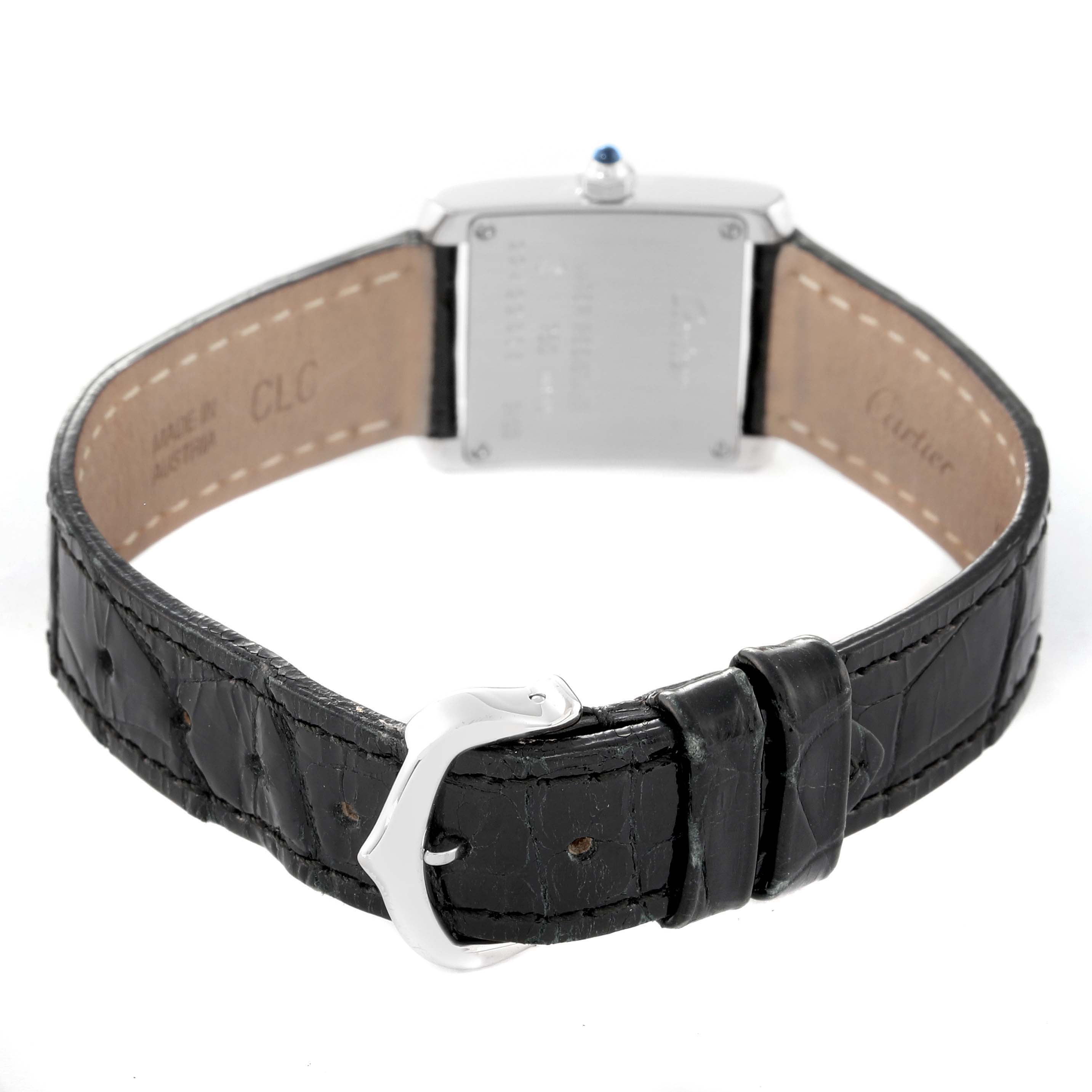 The image shows the back view of a Cartier Tank Française watch, highlighting the strap and clasp.