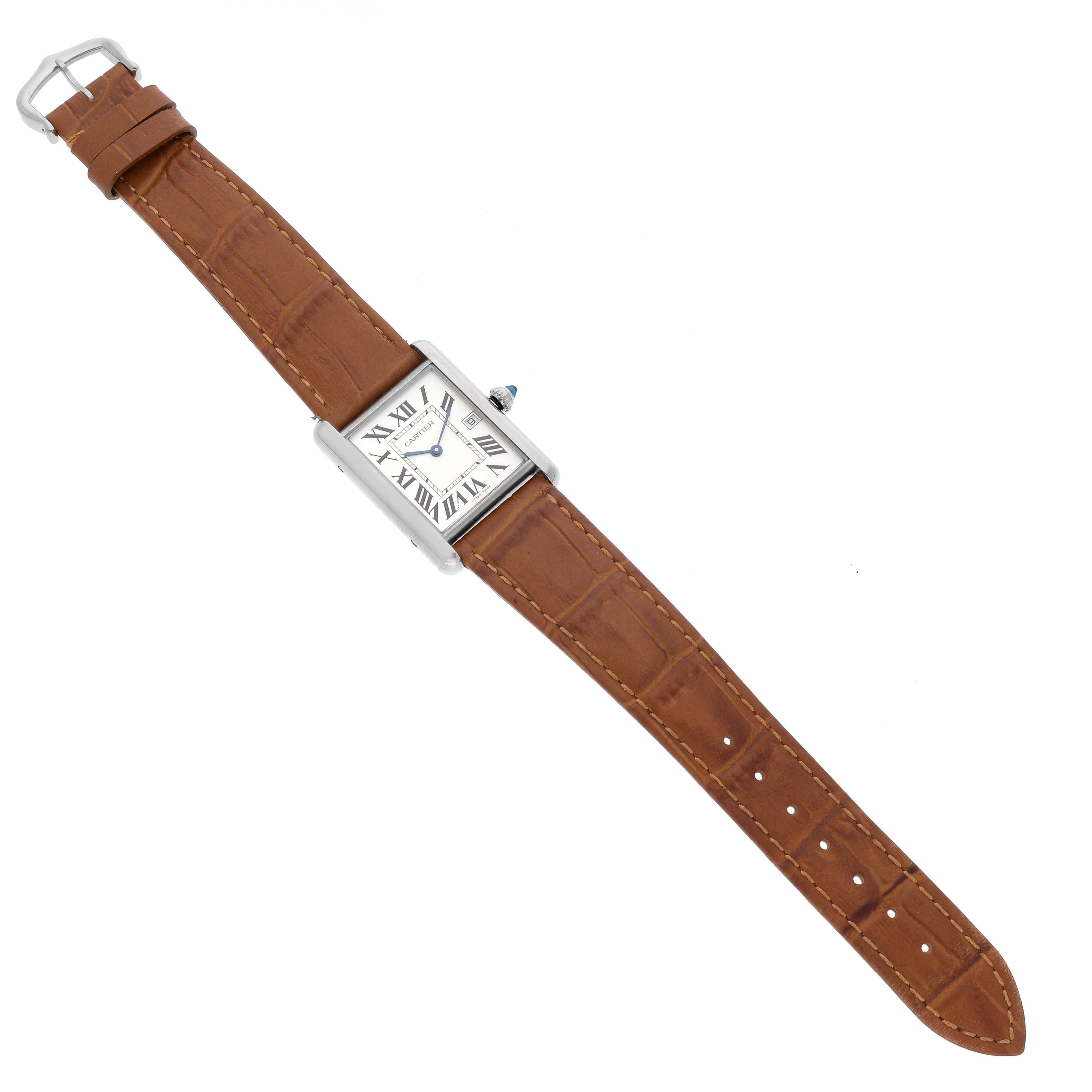The Cartier Tank Louis W1540956 Men's White Gold Silver Dial watch is shown at a top-down angle, featuring its rectangular face, blue hands, Roman numerals, and brown leather strap.