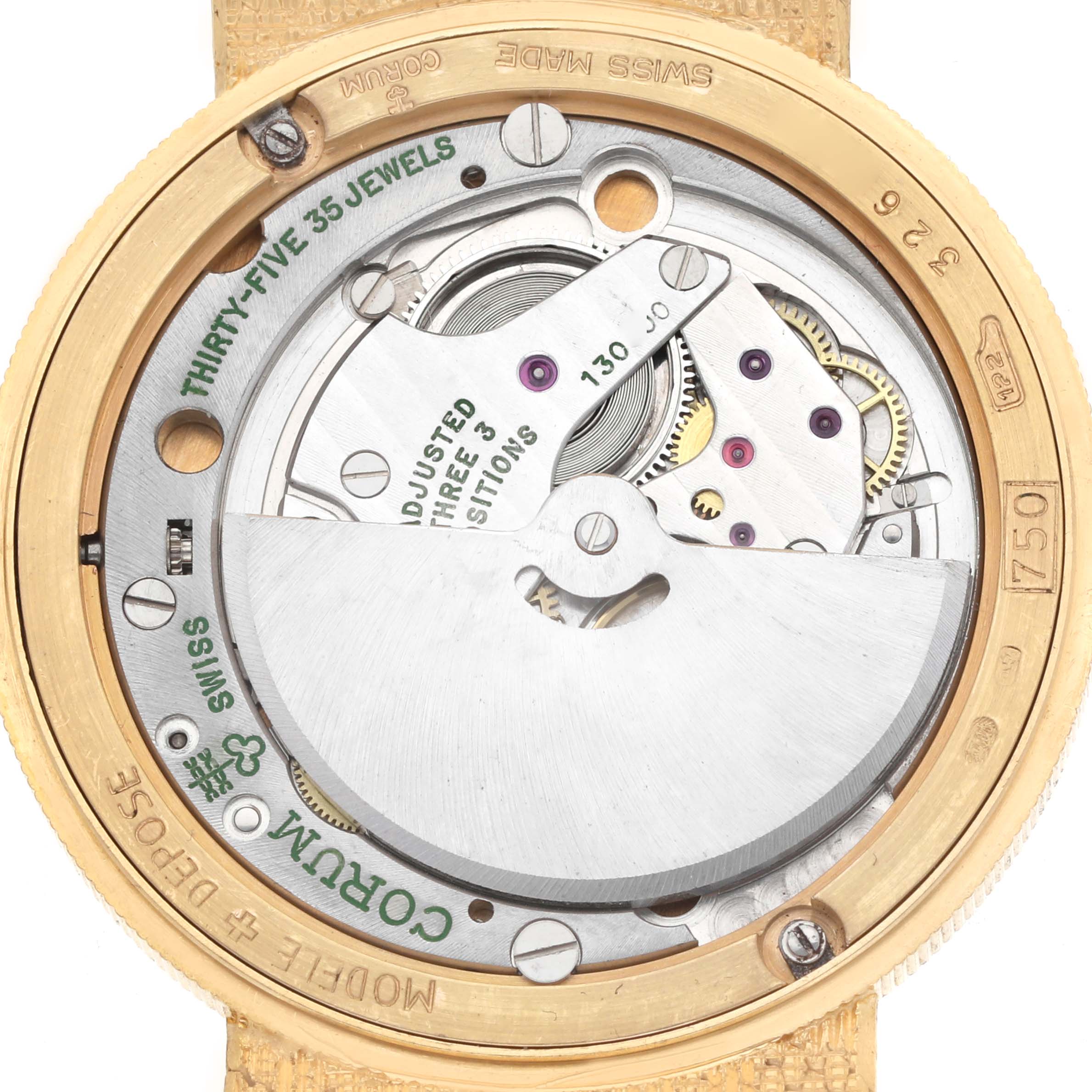 The image shows the back view of a Corum Coin Watch Men
s Yellow Gold Black Dial, highlighting the movement and internal mechanism details.