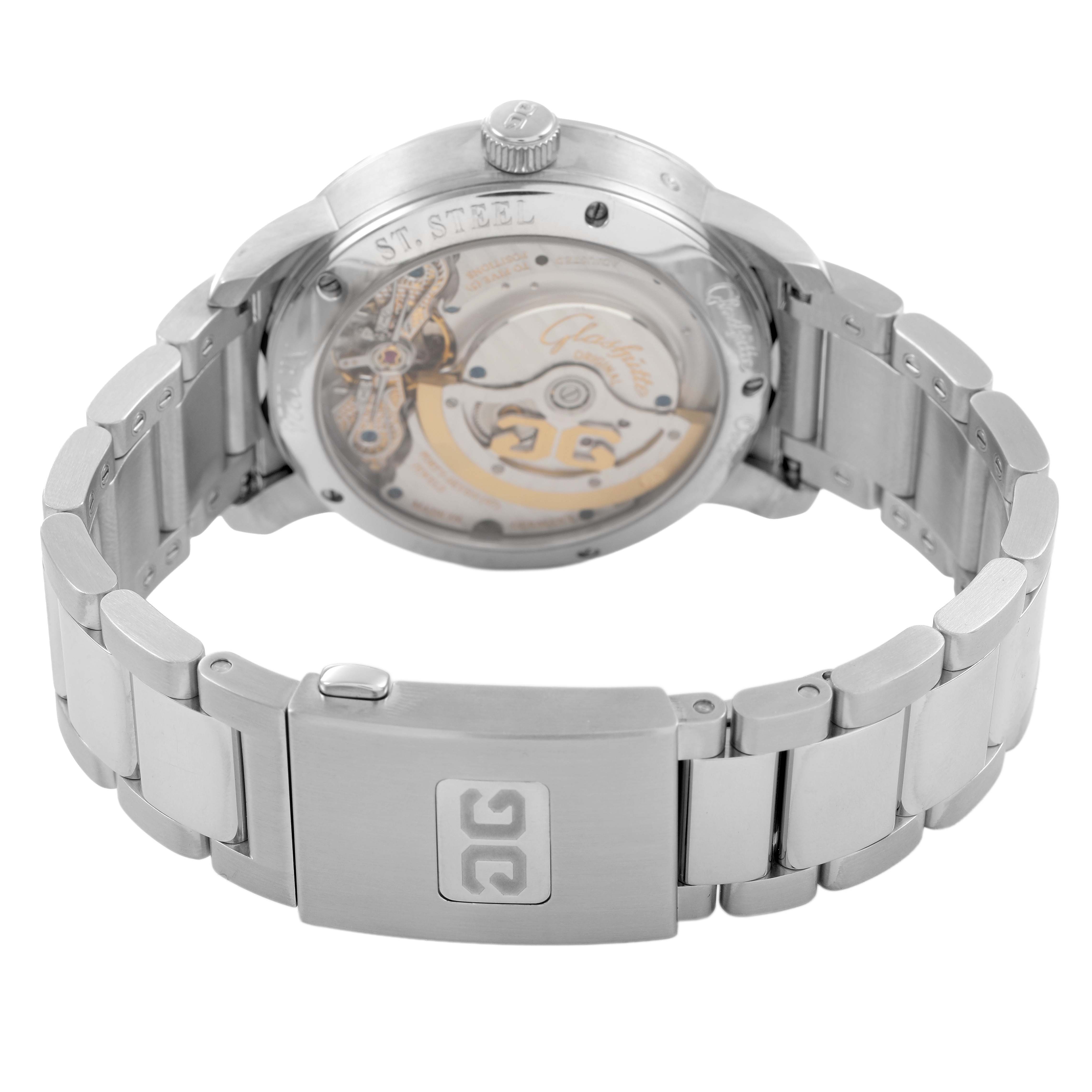 The Glashütte Pano watch is shown from the back, highlighting the open case back and metal bracelet.
