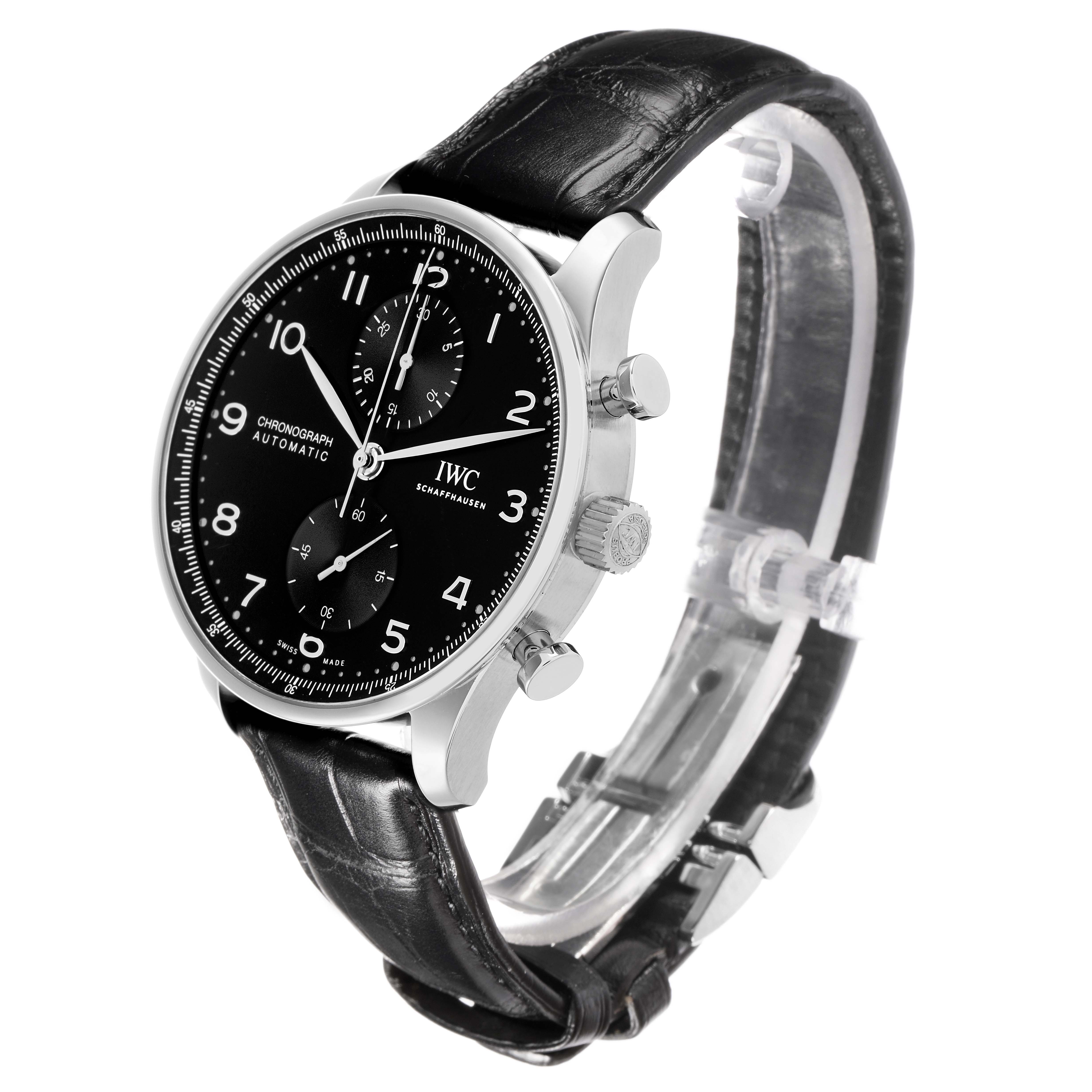 The IWC Portuguese IW371609 Men
s Stainless Steel Black Dial watch is shown at an angle highlighting the black dial, chronograph subdials, pushers, crown, and leather strap.
