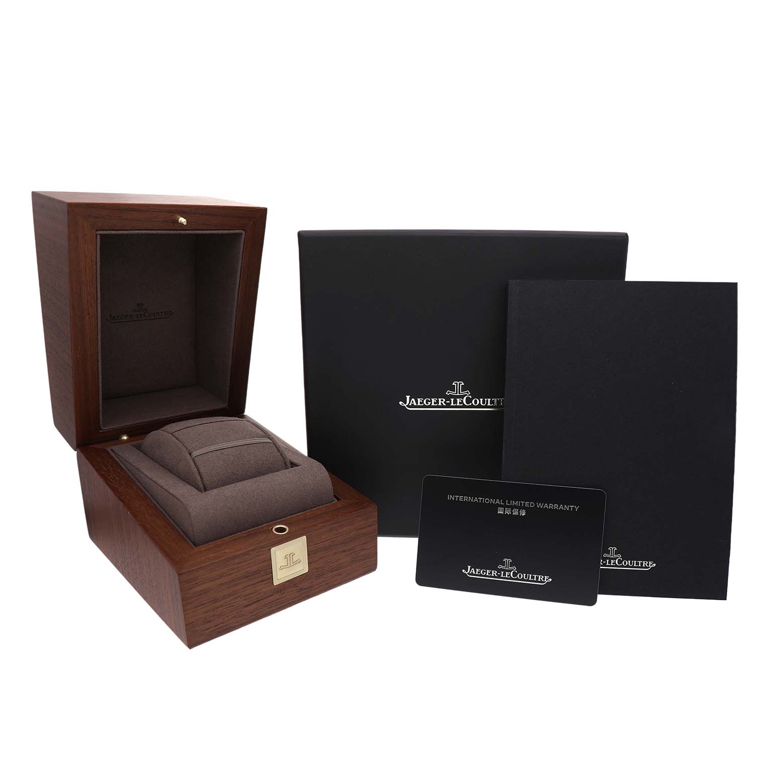 The image shows a Jaeger-LeCoultre Master model watch box, warranty card, and manual at an angled view.