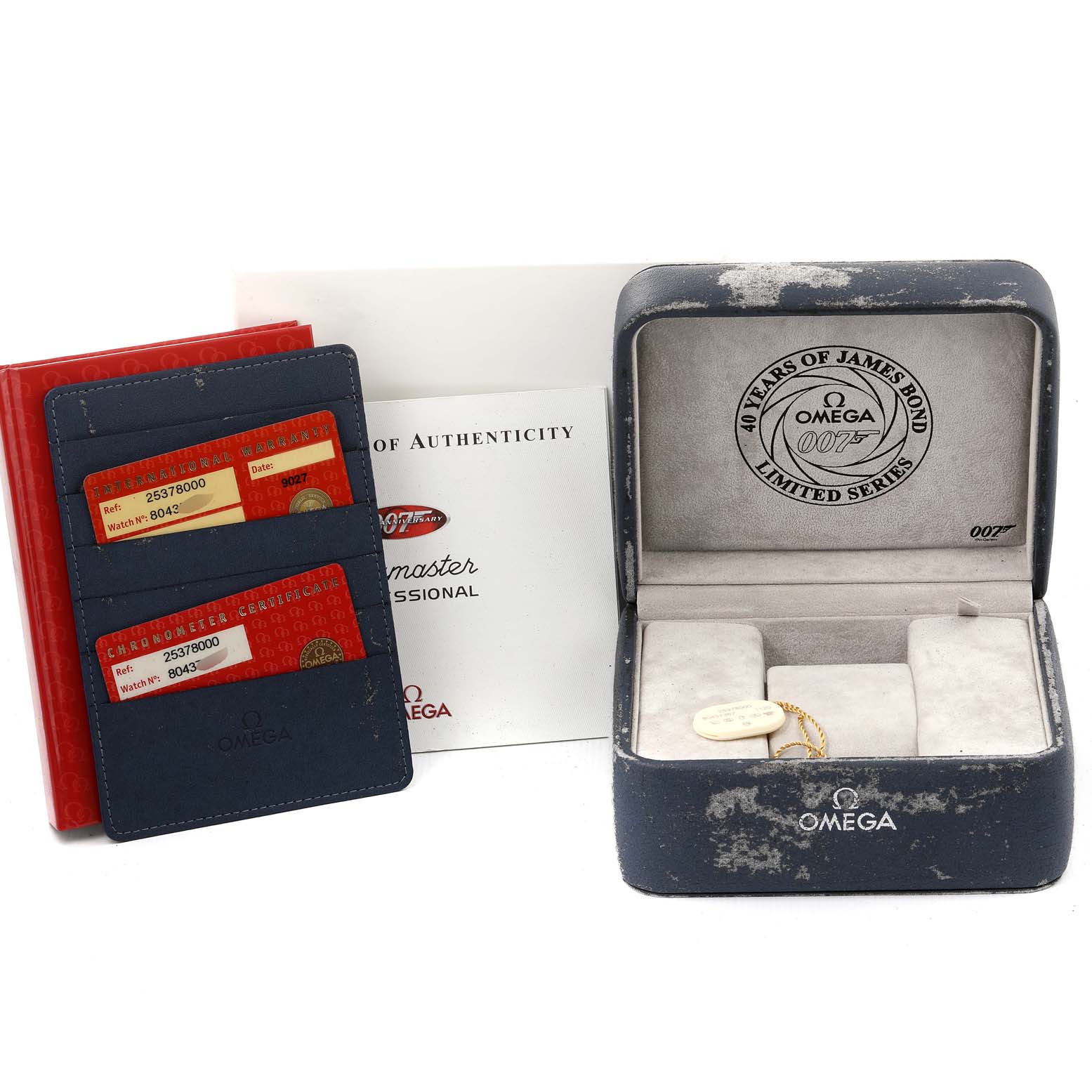 The image shows an open Omega Seamaster 2537.80.00 Men's Stainless Steel Blue Dial 2537.80.00 Men's Stainless Steel Blue Dial box, cards, a certificate of authenticity, and a pamphlet, but the watch is not visible.