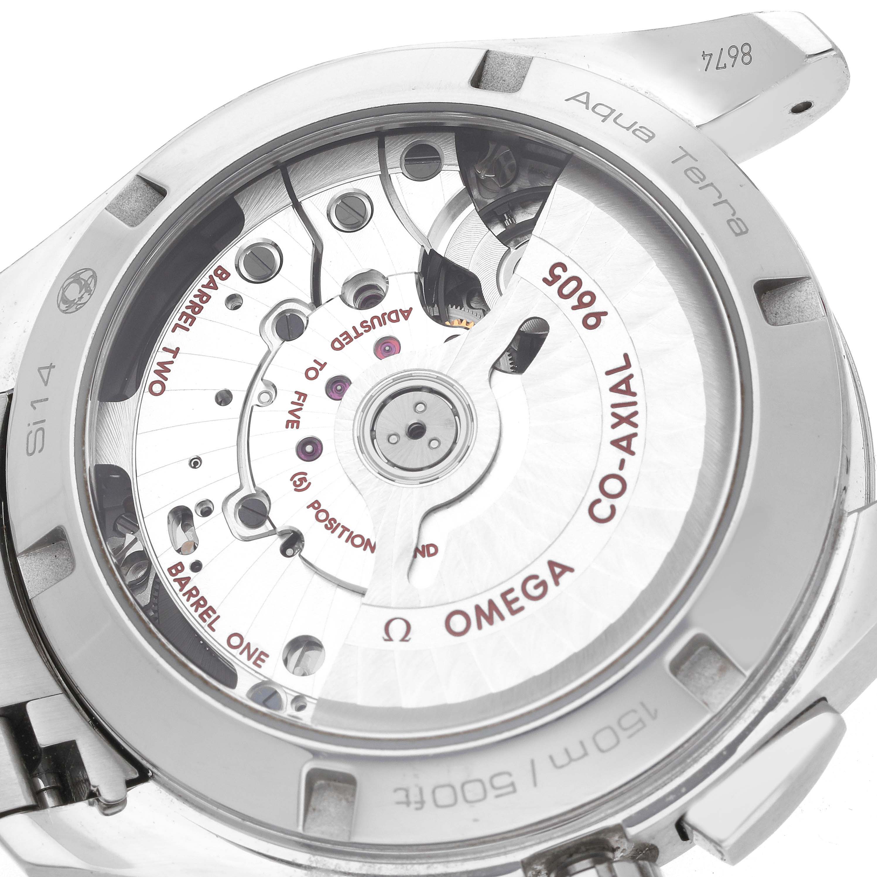 The image shows the case back of an Omega Seamaster 231.10.43.52.06.001 Men
s Stainless Steel Grey Dial, displaying the Co-Axial movement mechanics.