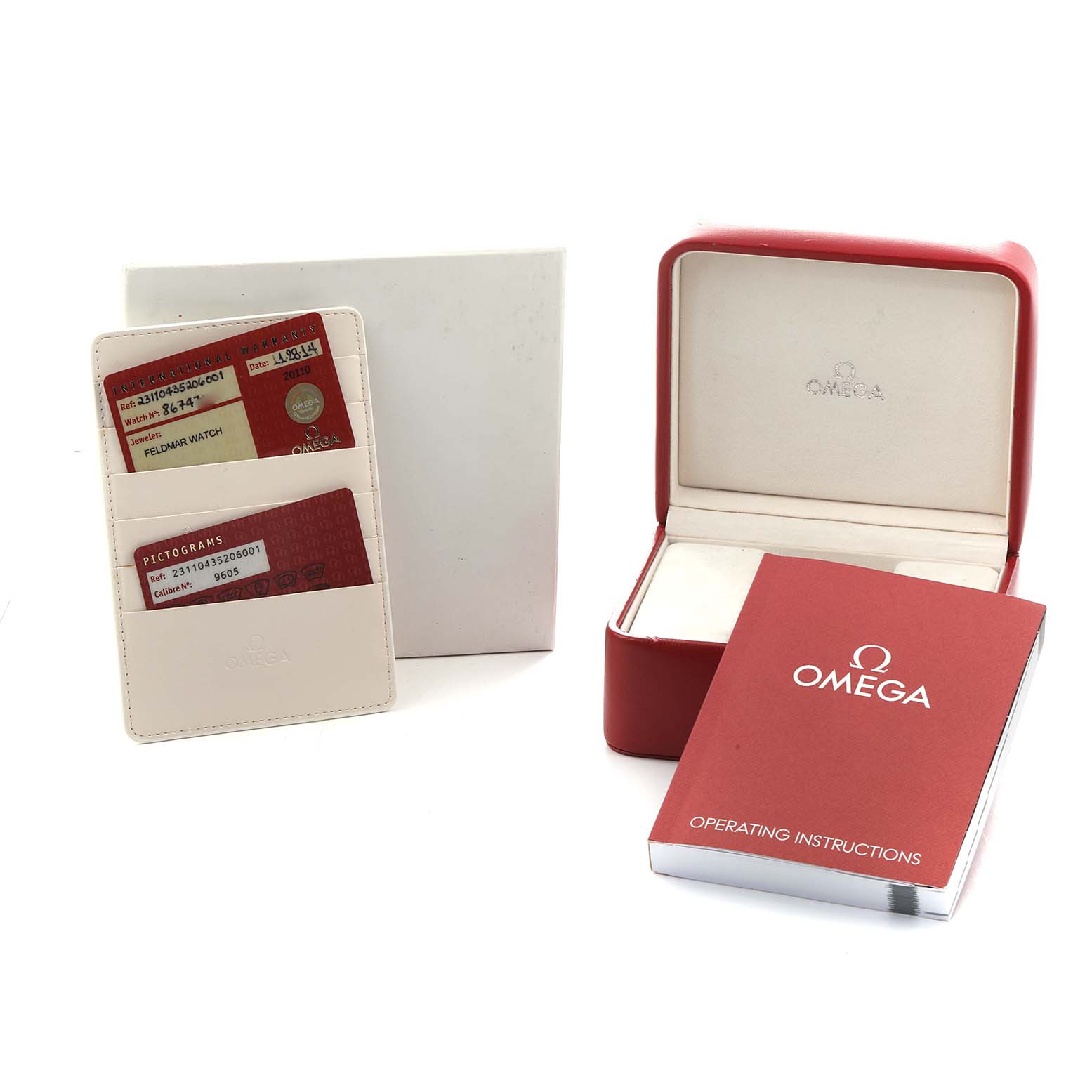 The image shows Omega Seamaster 231.10.43.52.06.001 Men
s Stainless Steel Grey Dial accessories, including a watch box, cards in a holder, and an operating instructions booklet.