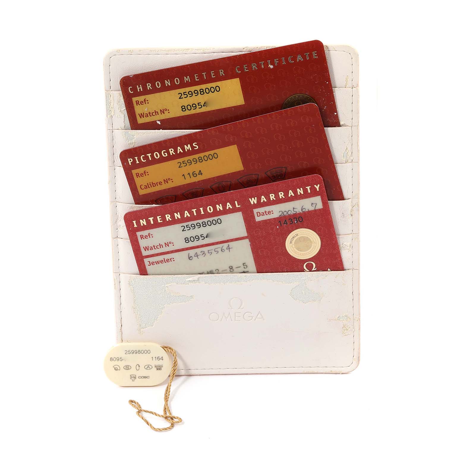 The image shows the Omega Seamaster 2599.80.00 Men
s Stainless Steel Blue Dial 2599.80.00 Men
s Stainless Steel Blue Dial model
s Chronometer Certificate, Pictograms, and International Warranty cards in a holder.