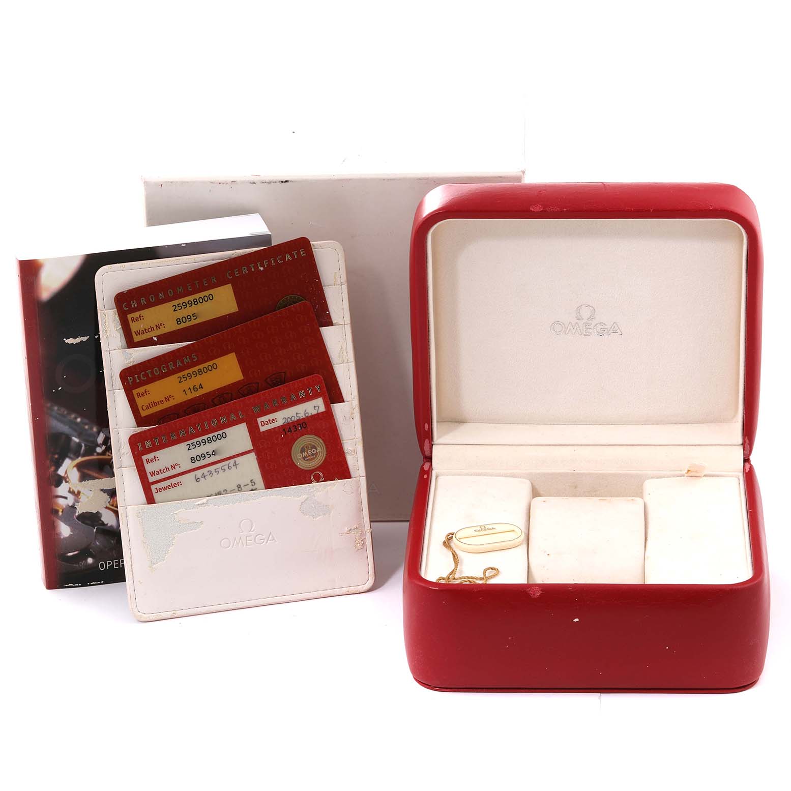 The image shows an Omega Seamaster 2599.80.00 Men
s Stainless Steel Blue Dial 2599.80.00 Men
s Stainless Steel Blue Dial watch box, warranty cards, and a white leather folder, all viewed from the front.