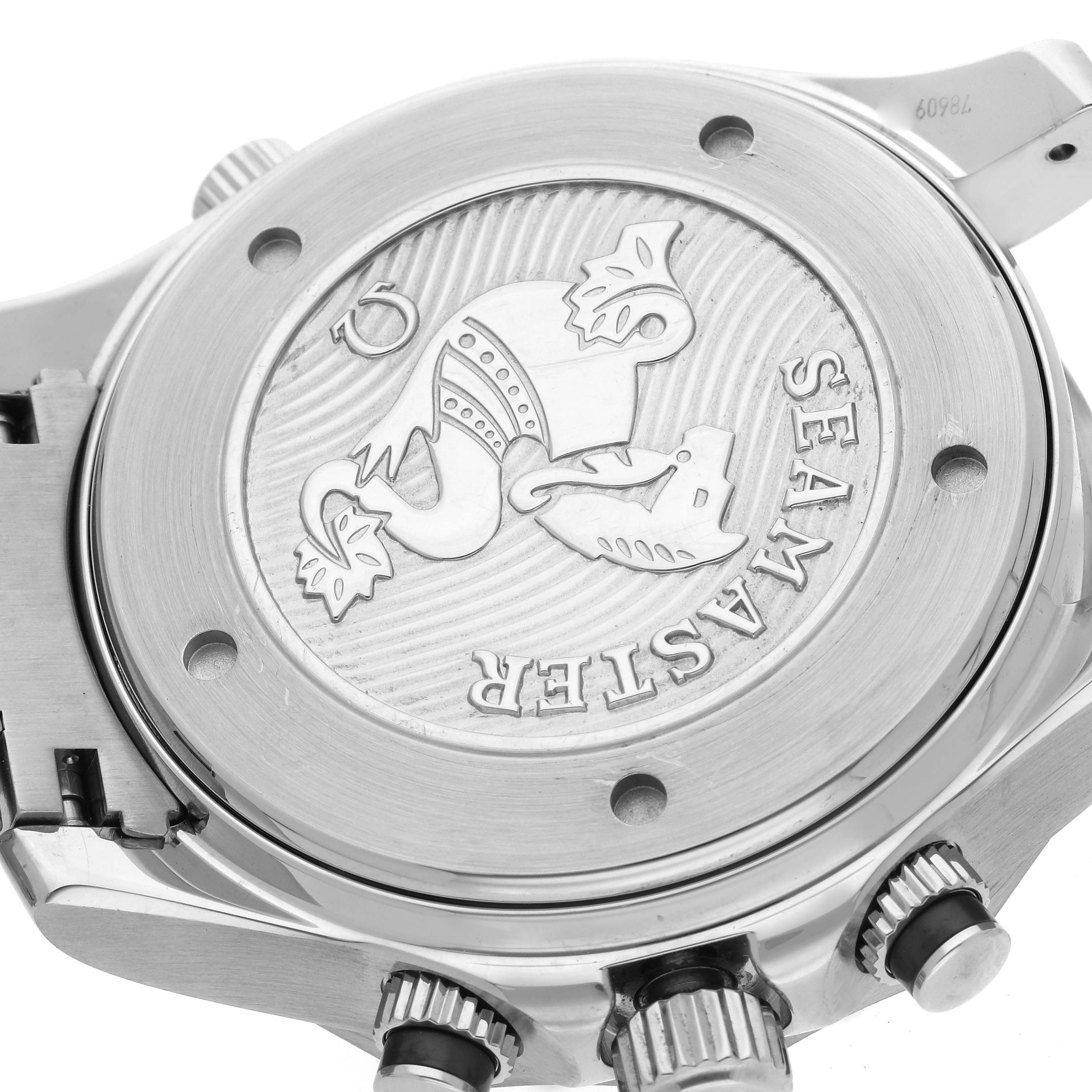 This is an angled close-up of the back case and side profile of the Omega Seamaster 212.30.44.52.01.001 Men's Stainless Steel Black Dial 212.30.44.52.01.001 Men's Stainless Steel Black Dial watch showing its engravings and crown.