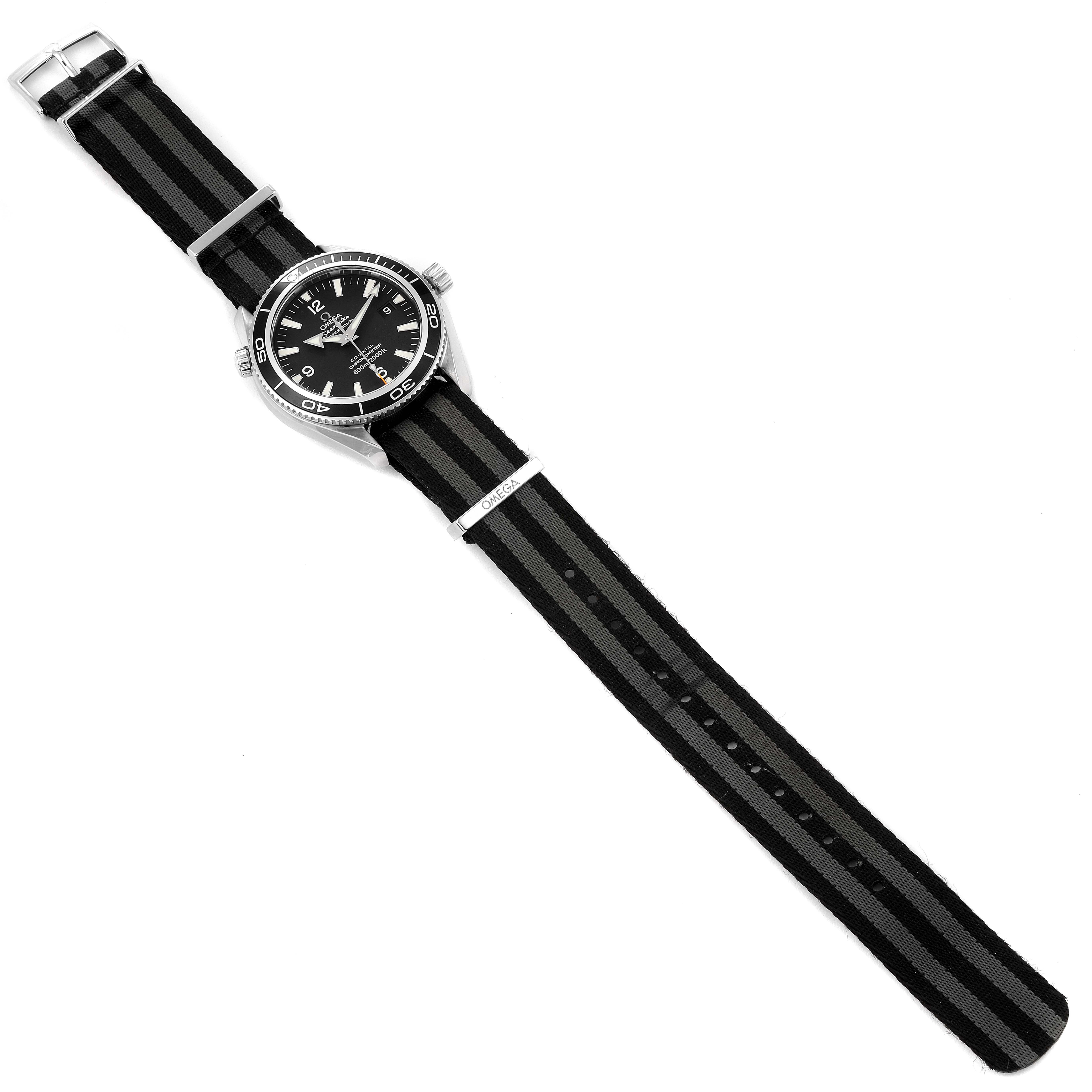 The Omega Planet Ocean 2201.50.00 Men's Stainless Steel Black Dial 2201.50.00 Men's Stainless Steel Black Dial watch is shown from a top-down angle, displaying its face, bezel, and black-striped NATO strap.