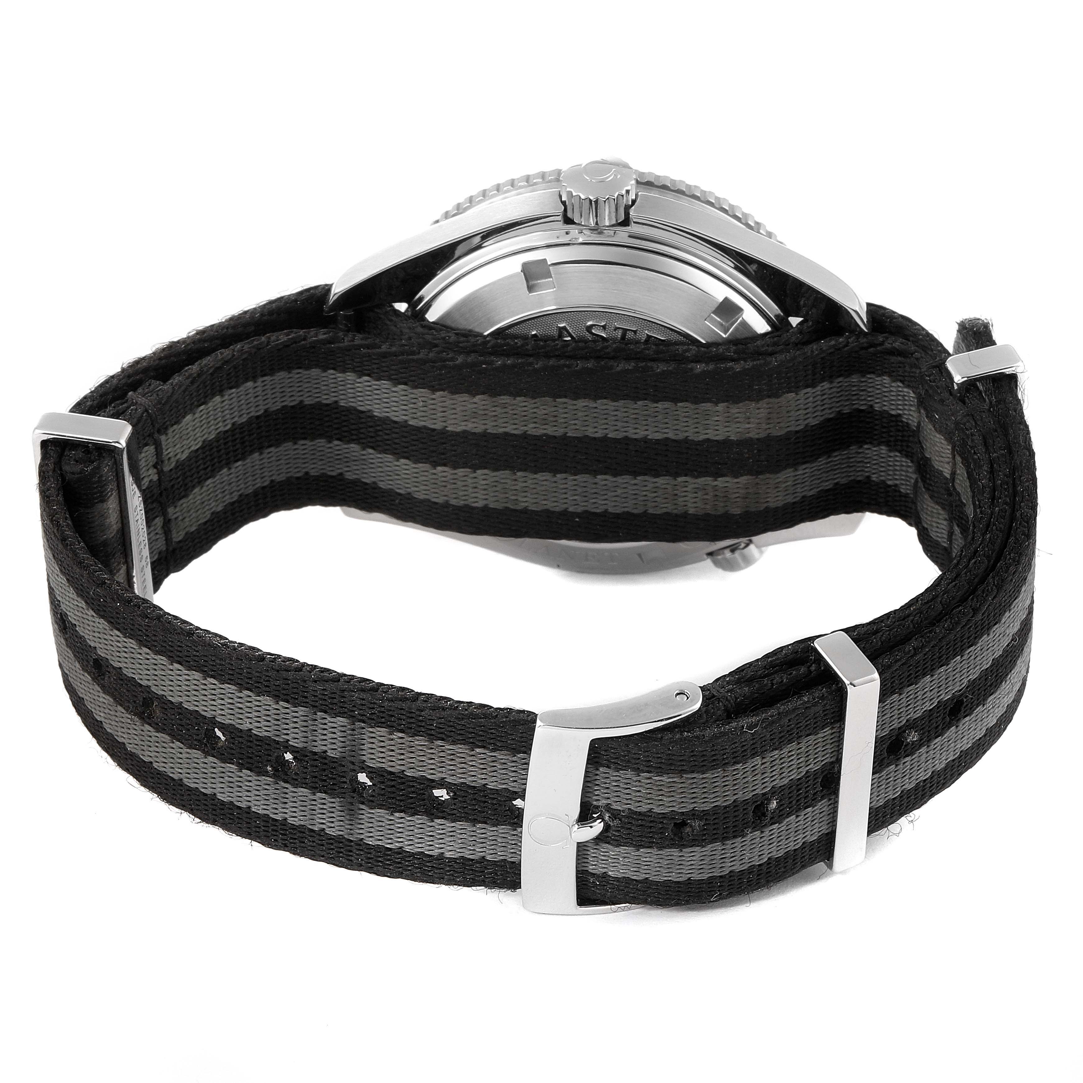 The image shows the back view of the Omega Planet Ocean 2201.50.00 Men's Stainless Steel Black Dial 2201.50.00 Men's Stainless Steel Black Dial watch, including the case back and a striped fabric strap.