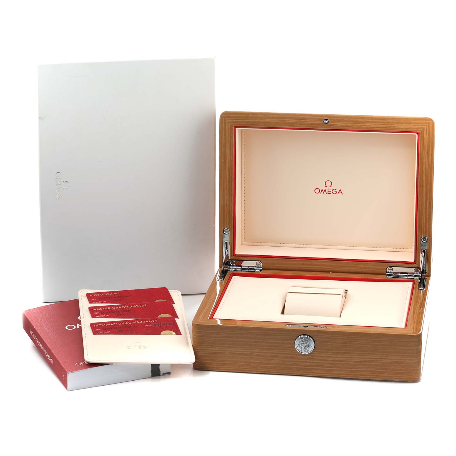 The image shows an Omega Speedmaster 304.33.44.52.03.001 Men
s Stainless Steel Blue Dial watch box, warranty cards, and a manual from a front angle.